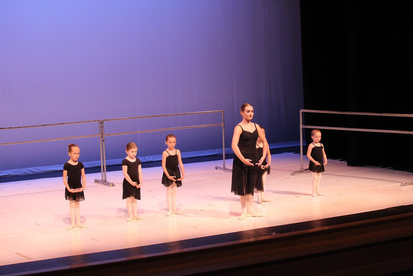 a group of women on a stage