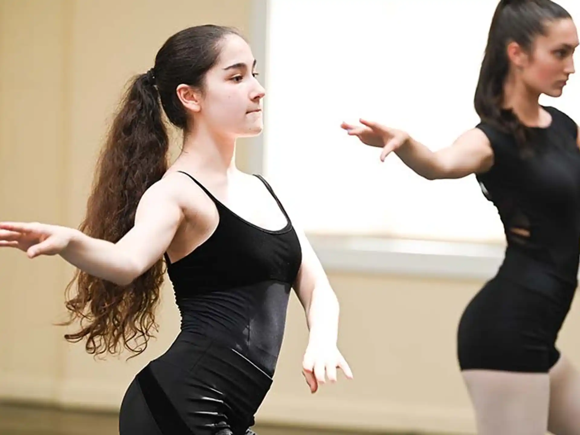 a couple of women dancing