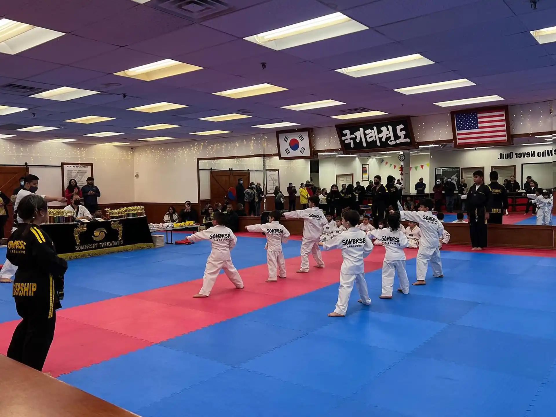 a group of people in a karate class