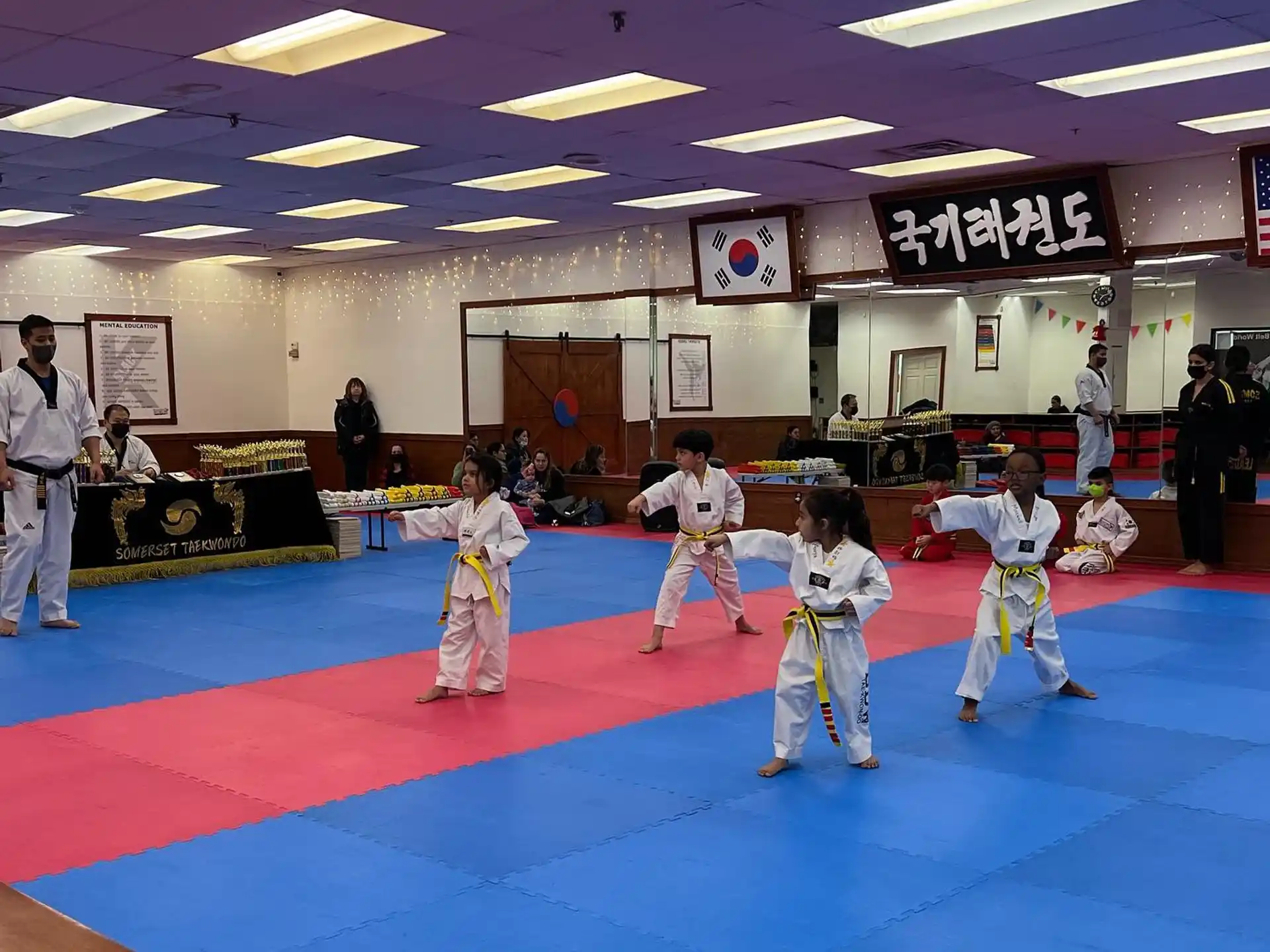 a group of people in karate uniforms
