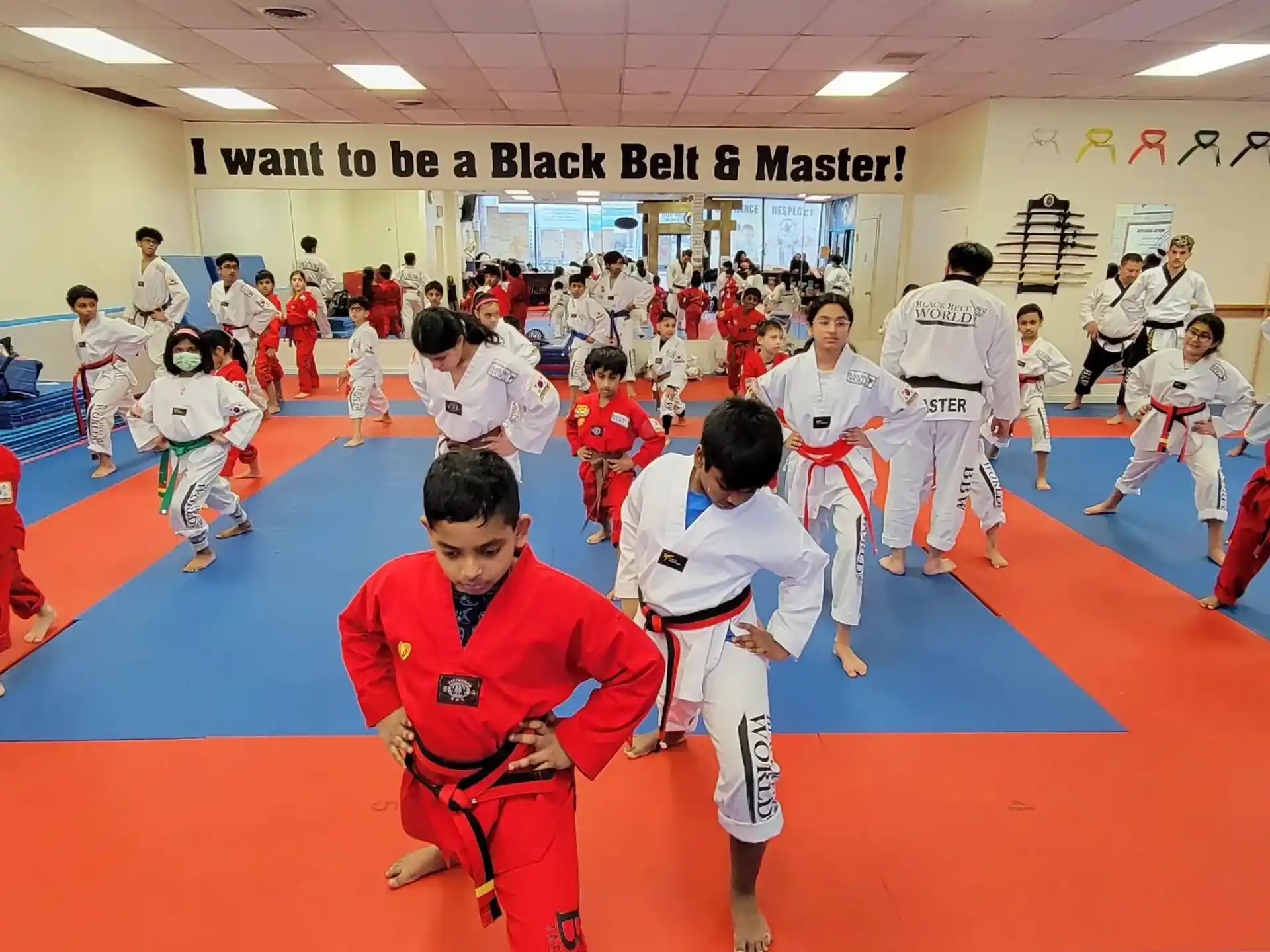 a group of people in a karate class