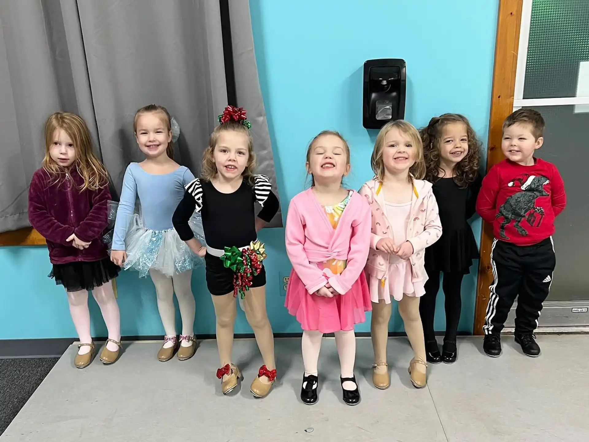 a group of children posing for a photo