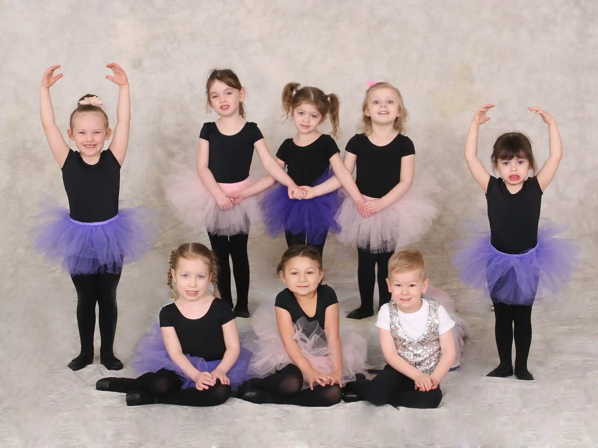 a group of children posing for a photo