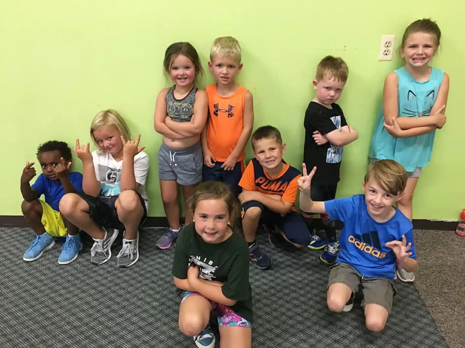 a group of children posing for a photo