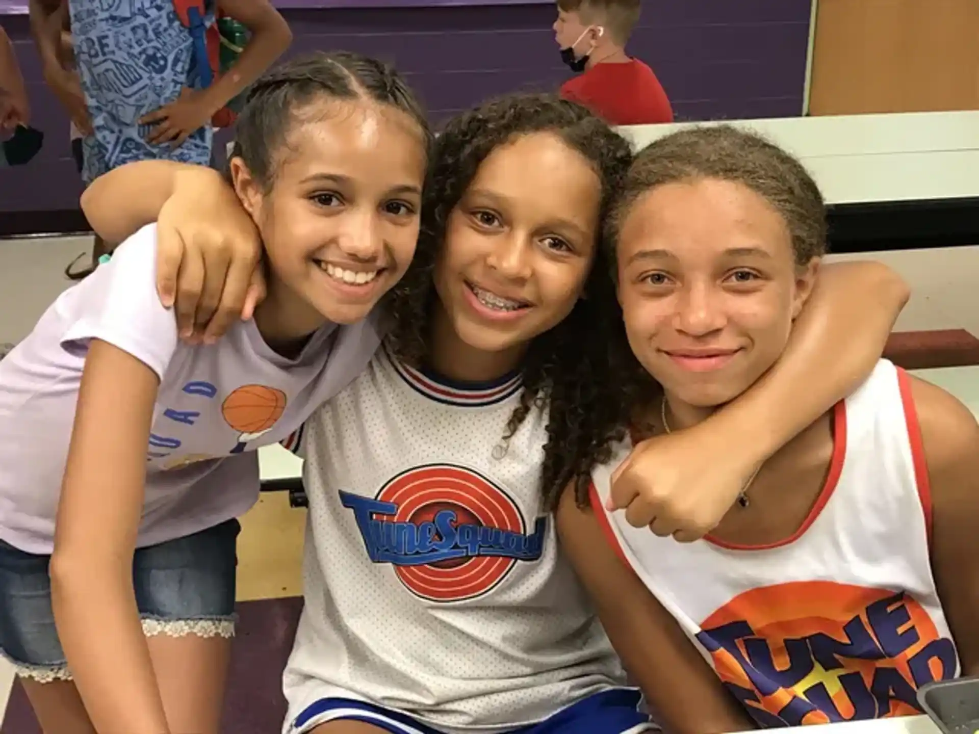 a group of girls posing for a photo
