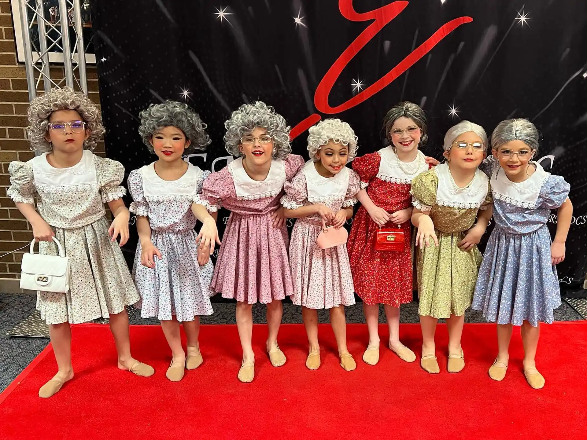 a group of children posing for a photo