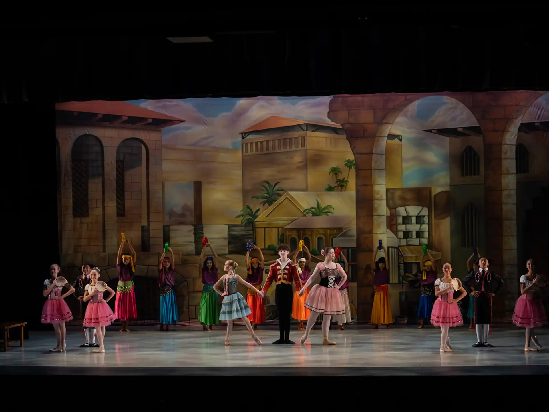 a group of people performing on a stage