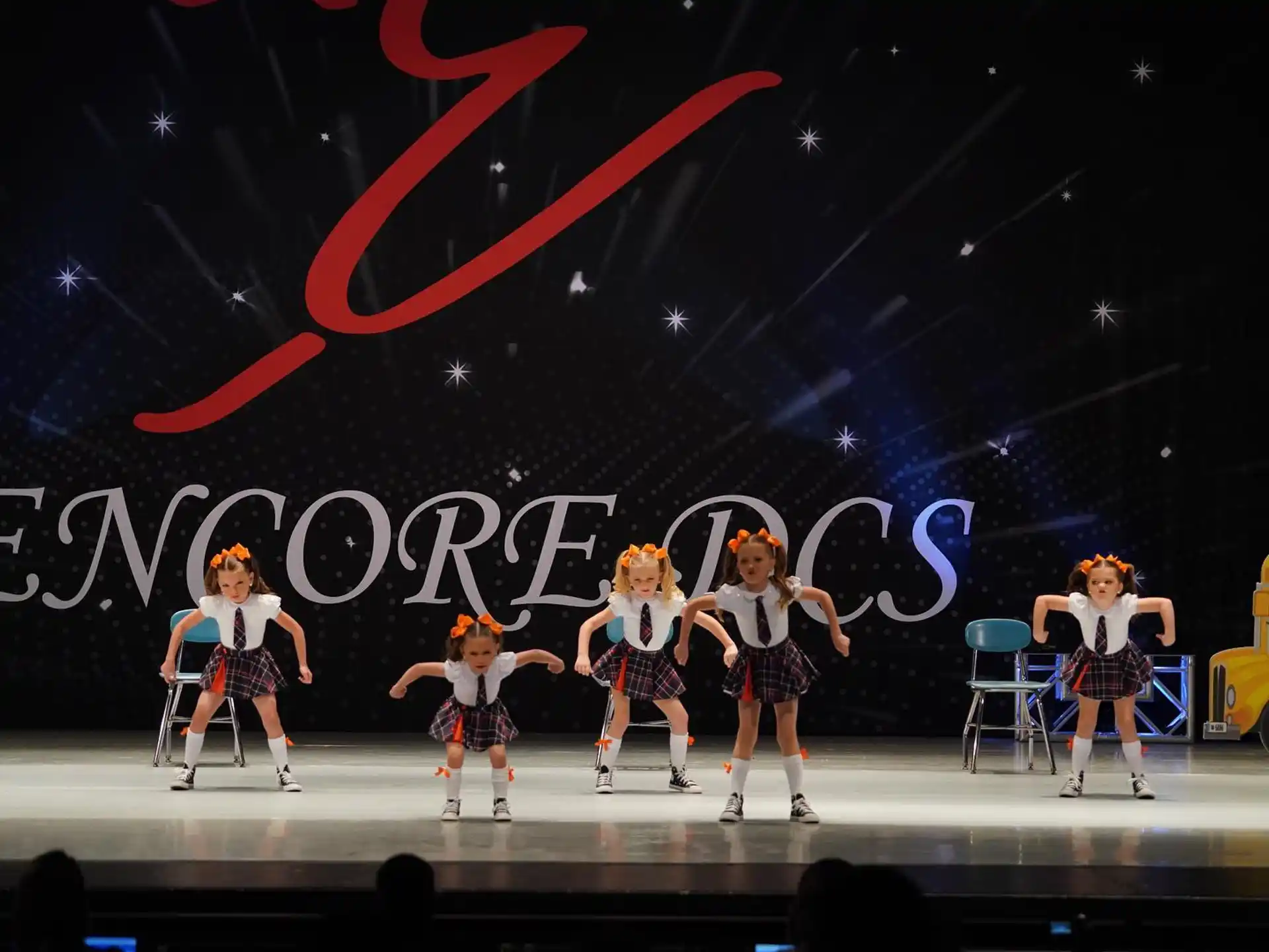 a group of women on a stage