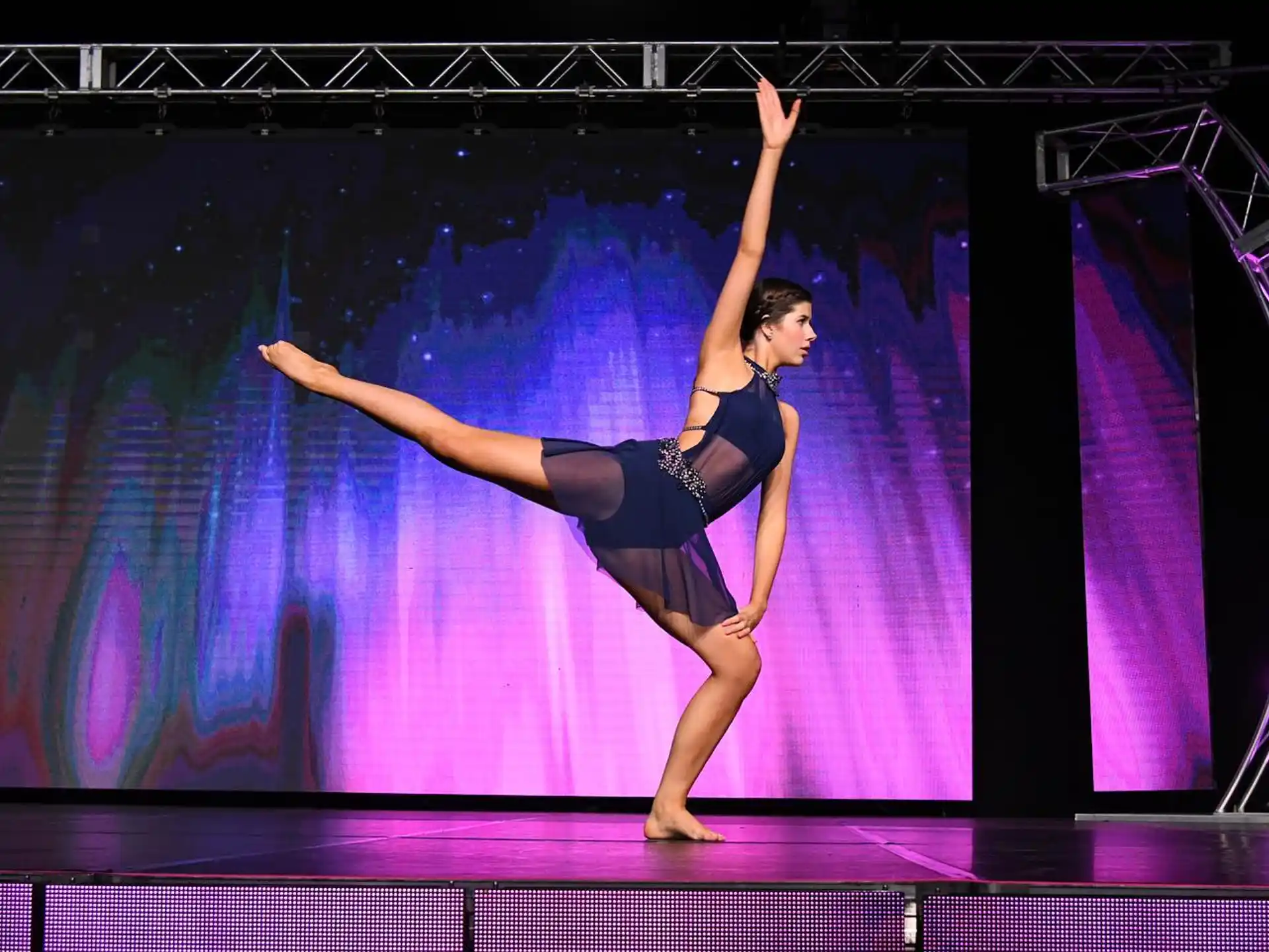 a man dancing on a stage