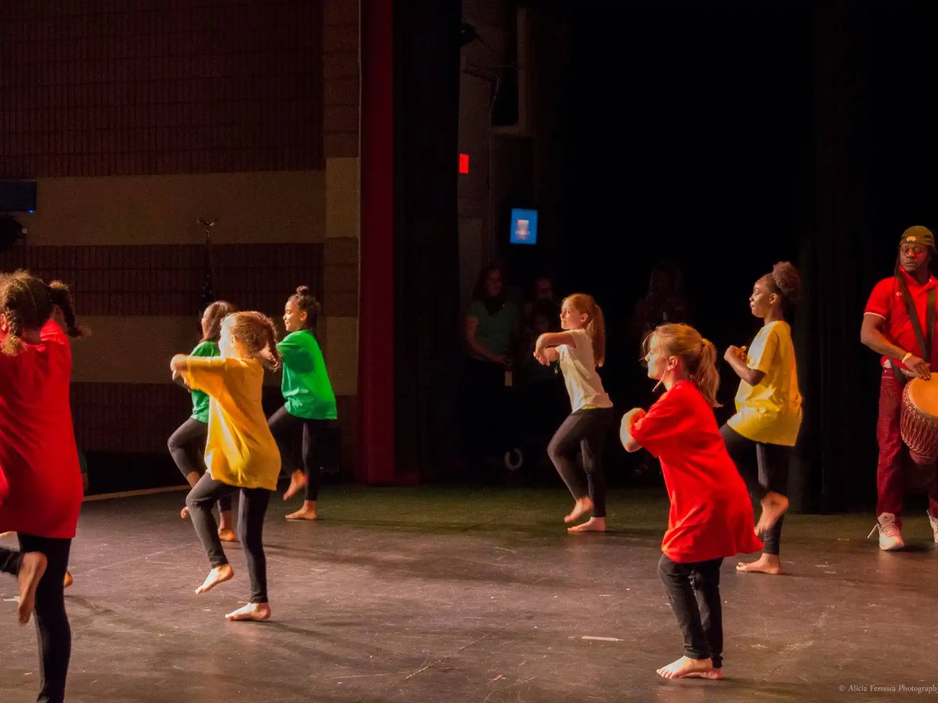 a group of children dancing