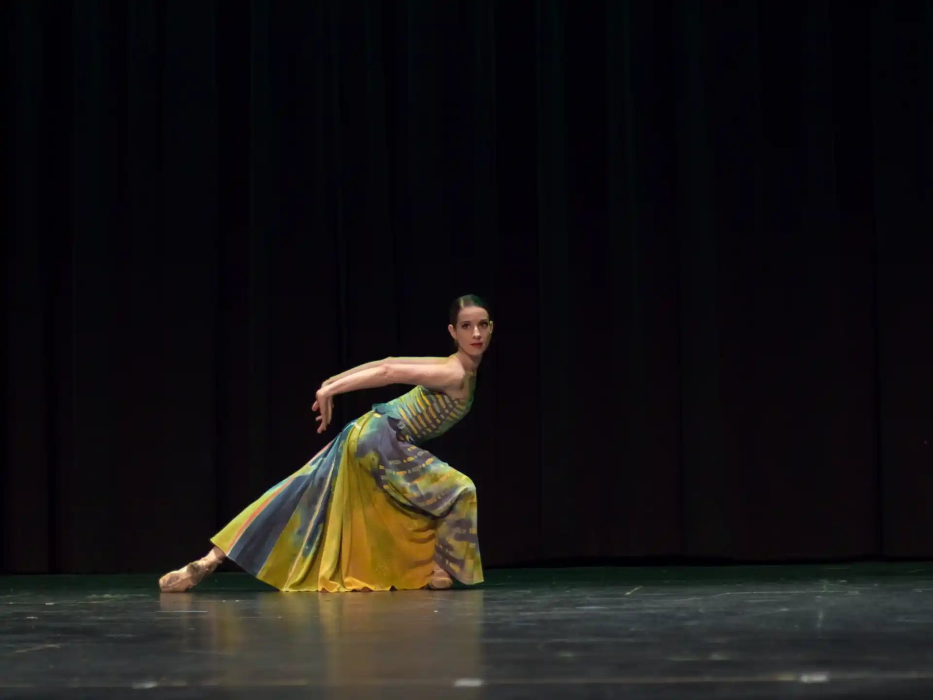 a man dancing on a stage