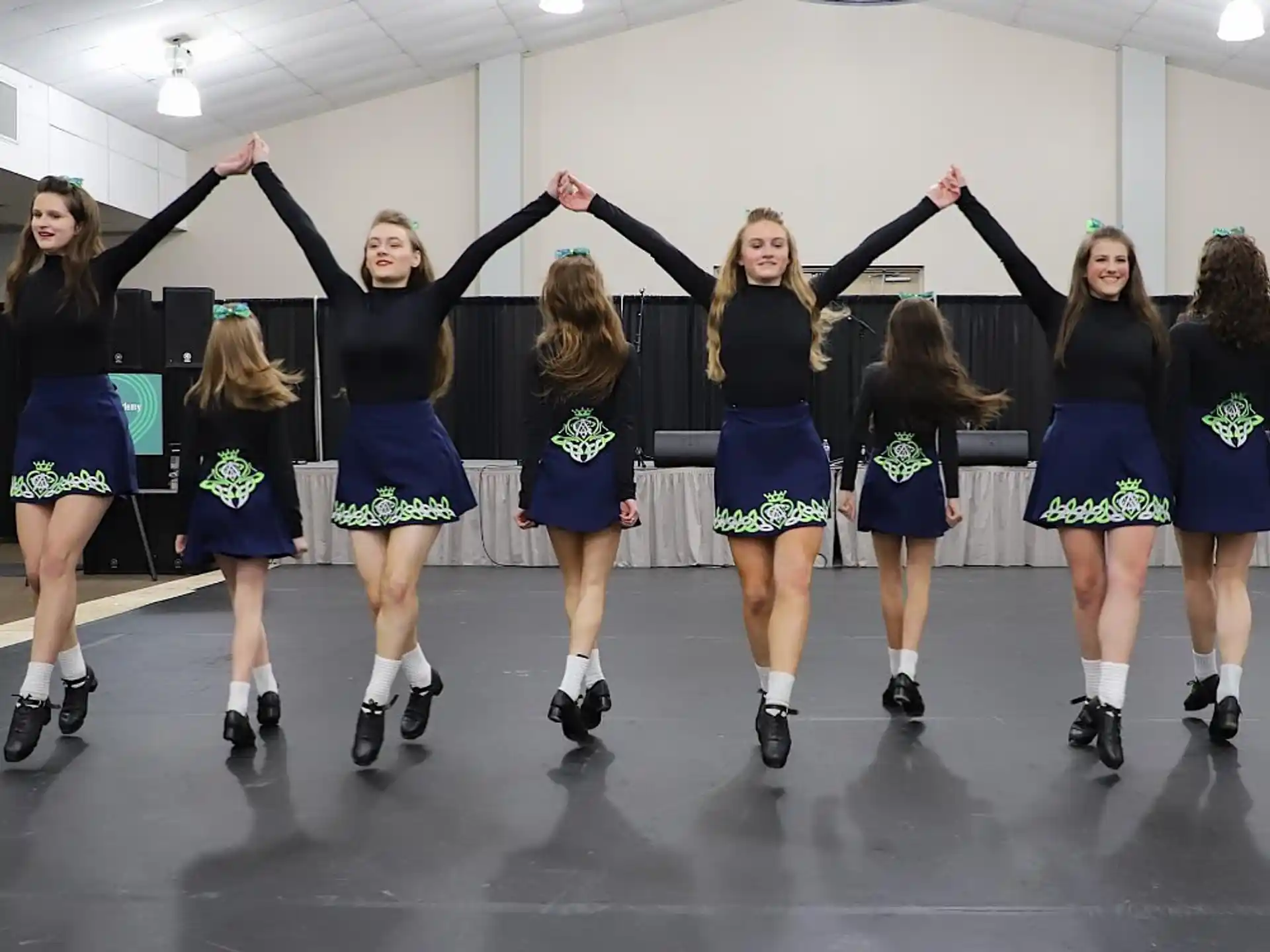 a group of cheerleaders in a room
