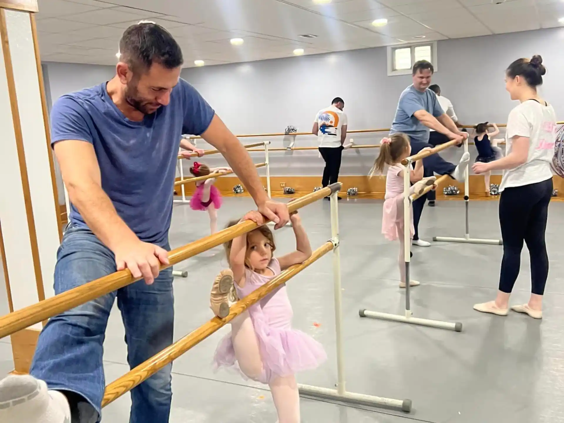 a man and a girl exercising