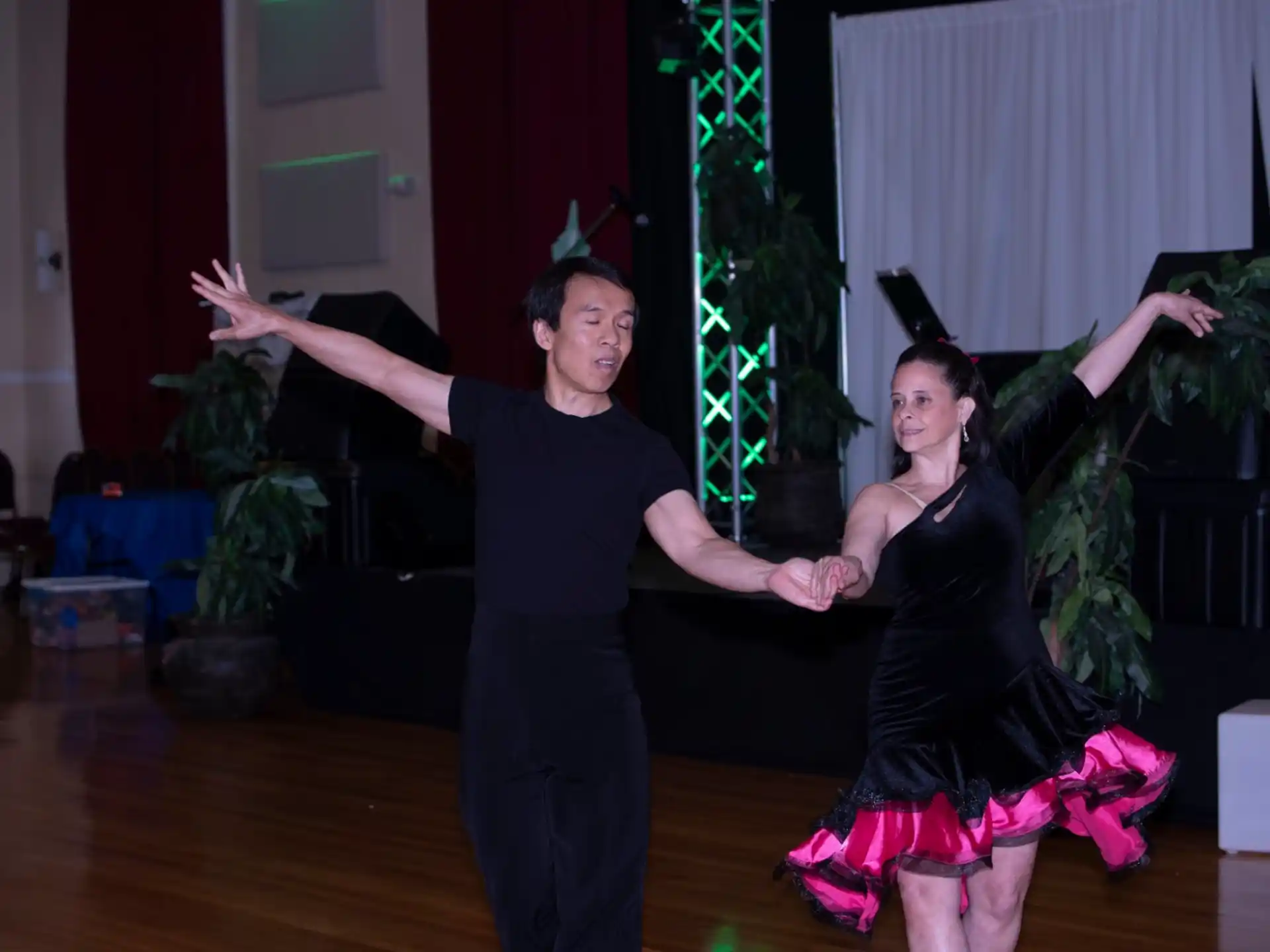 a man and woman dancing