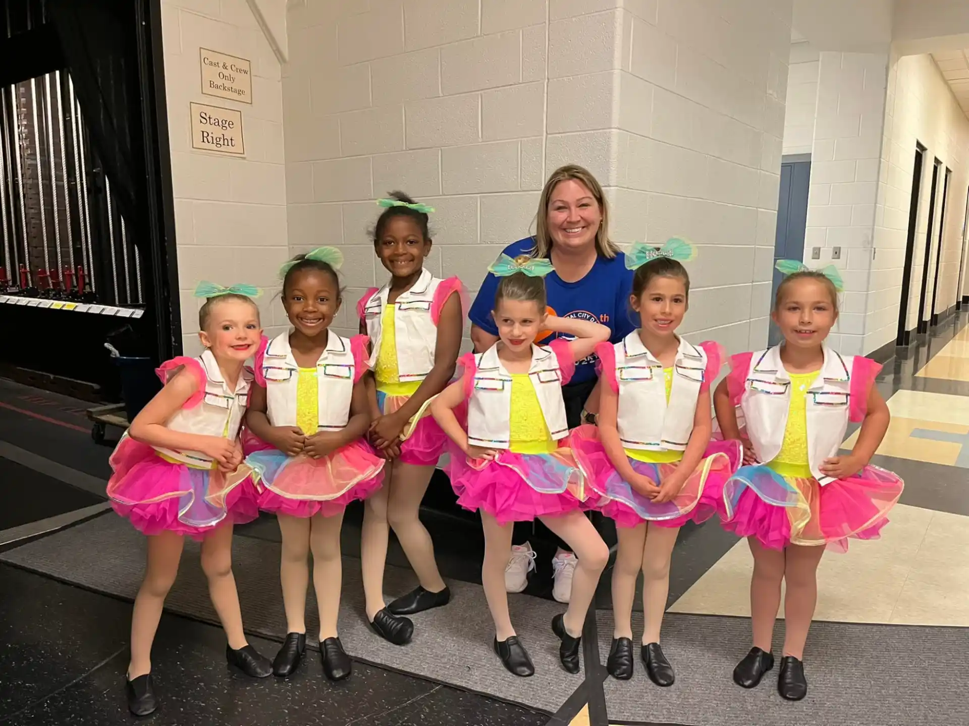 a group of girls in clothing