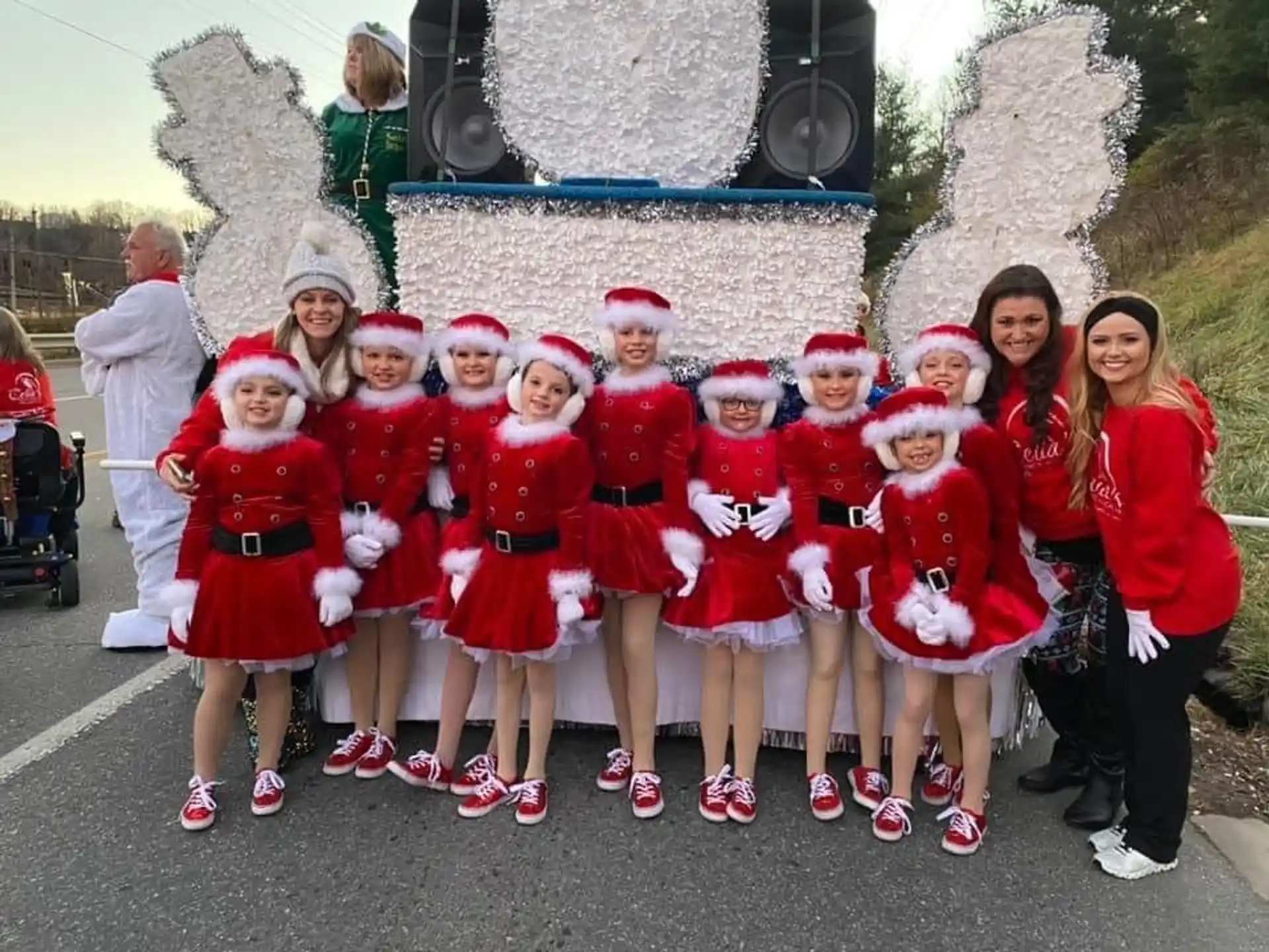 a group of children in santa hats