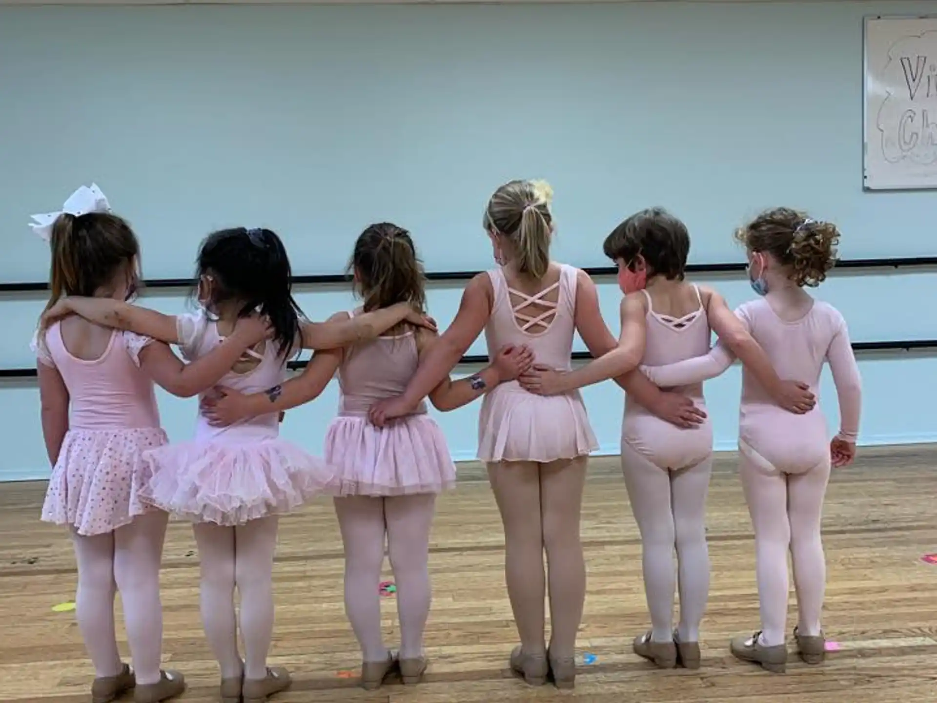 a group of girls in a gym