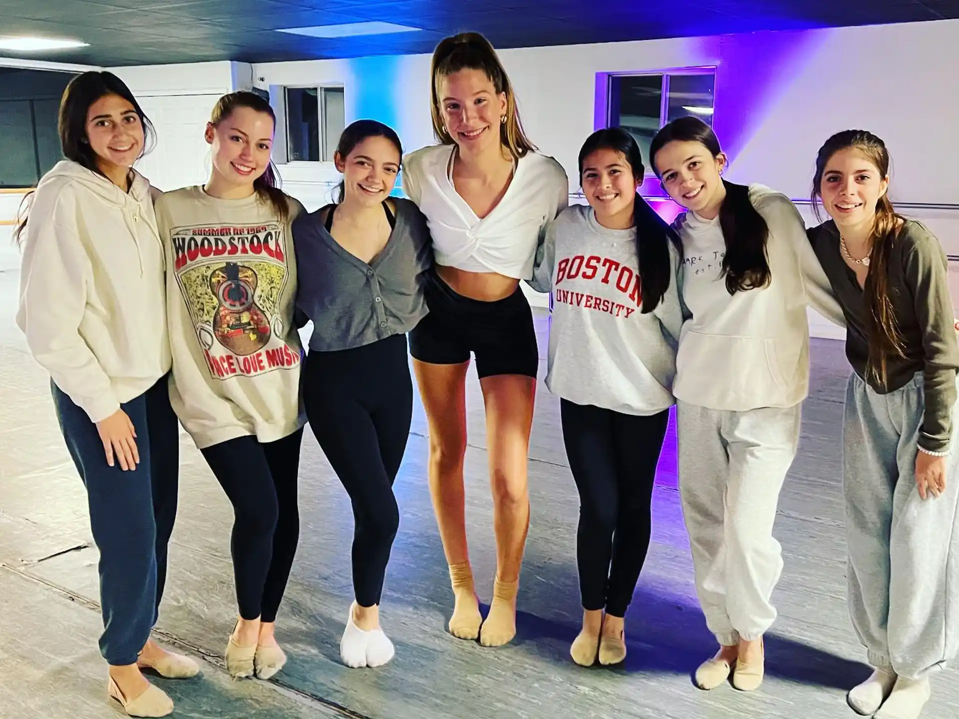 a group of women posing for a photo