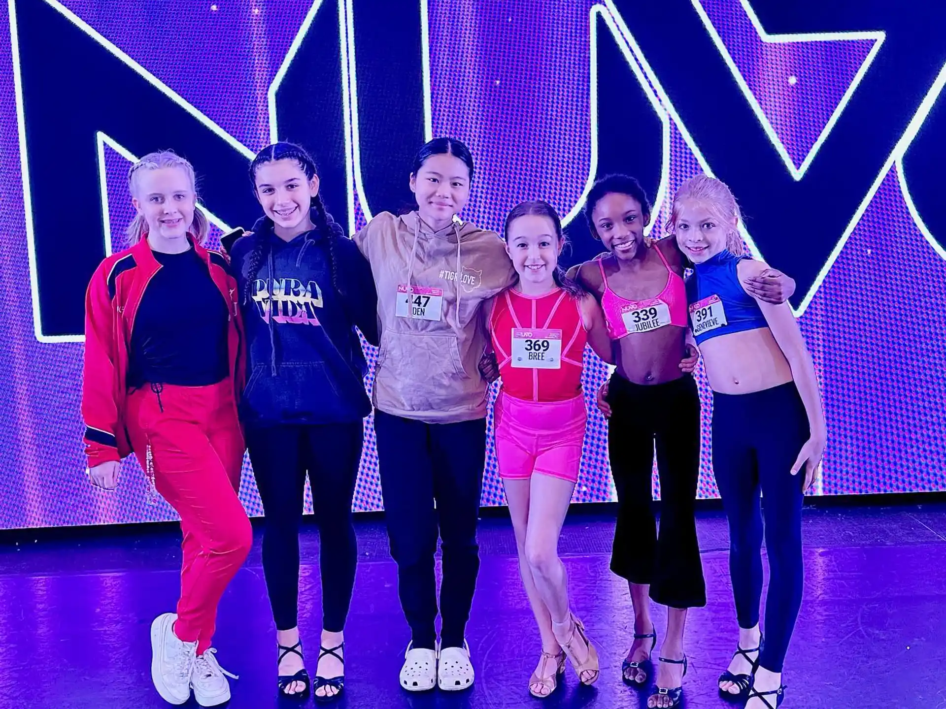 a group of people posing for a photo