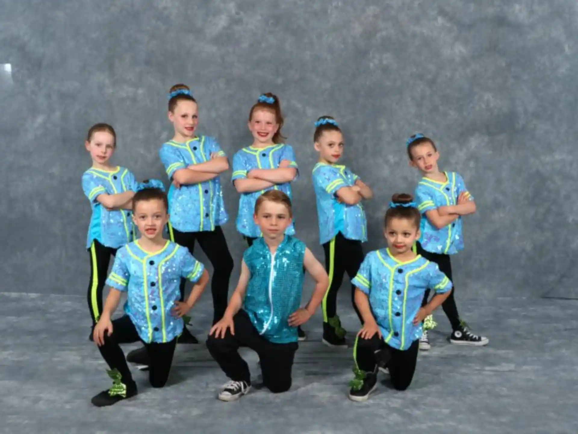 a group of children posing for a photo