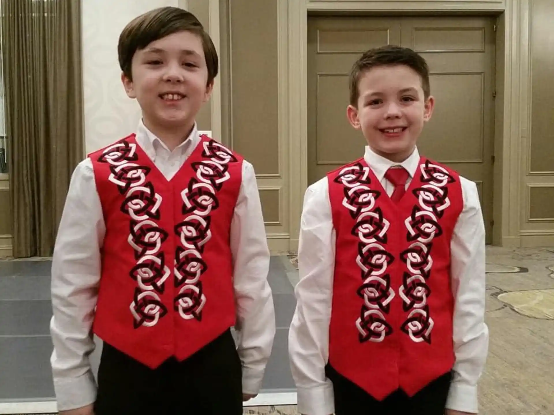two boys wearing school uniforms