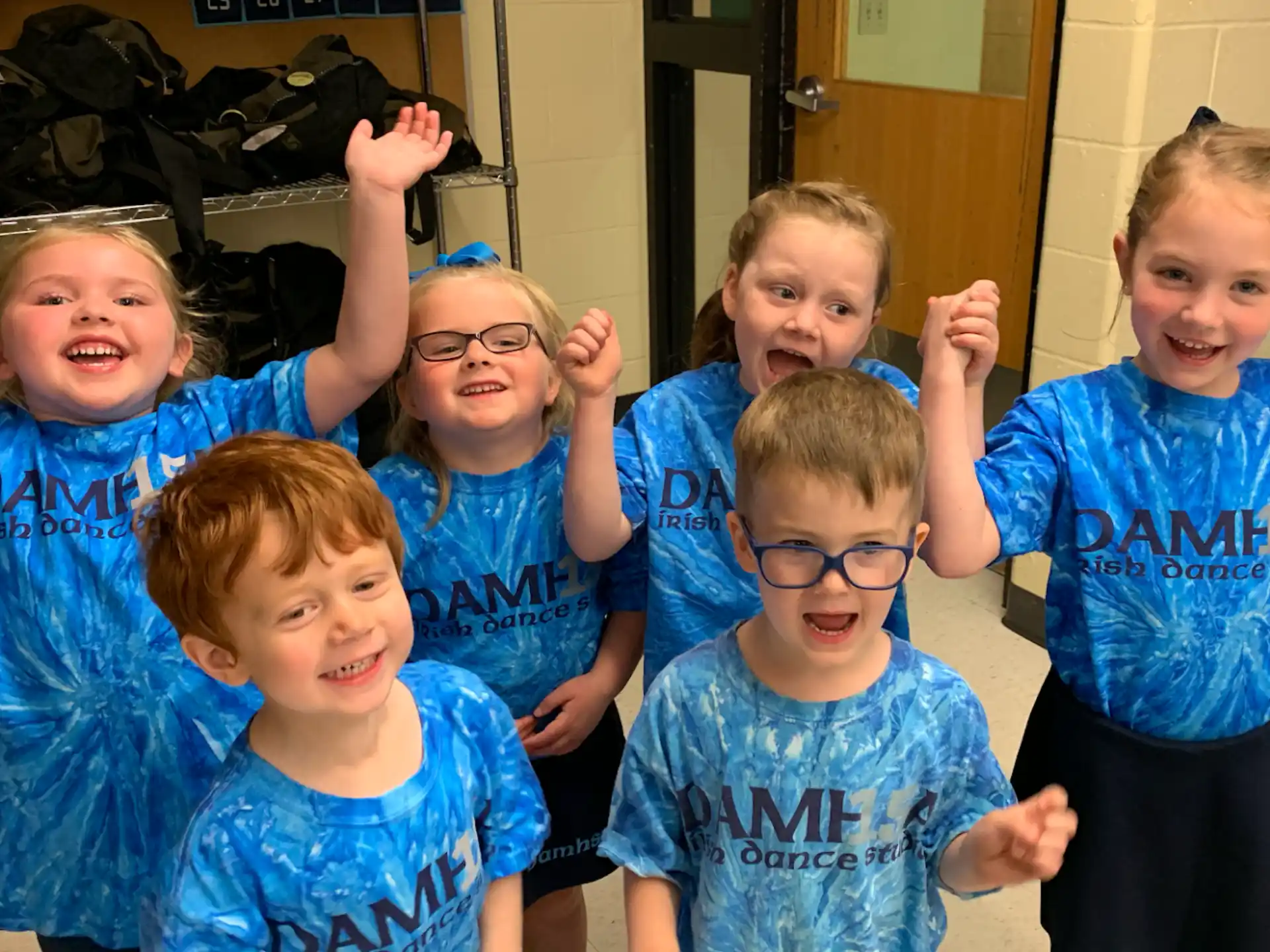 a group of children posing for a photo