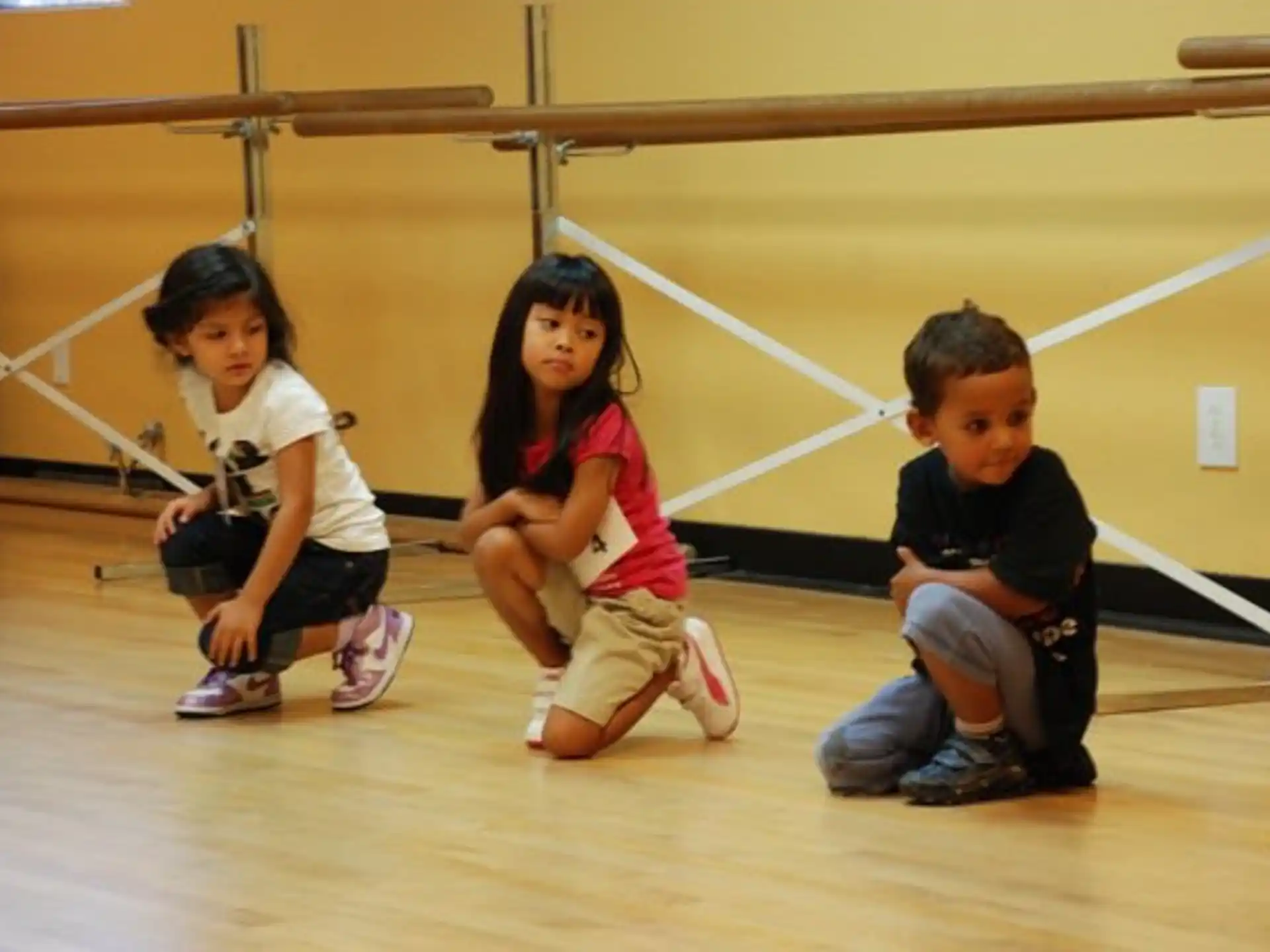 a group of children sitting on the floor