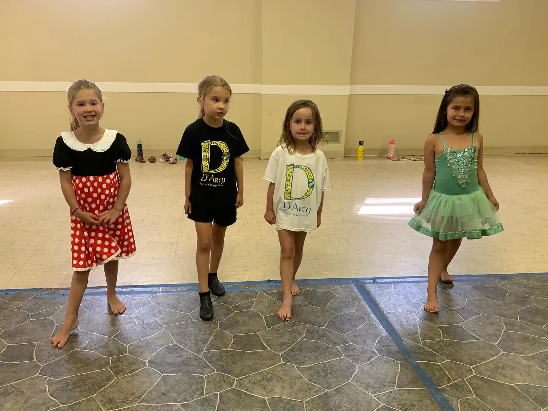 a group of girls posing for a photo