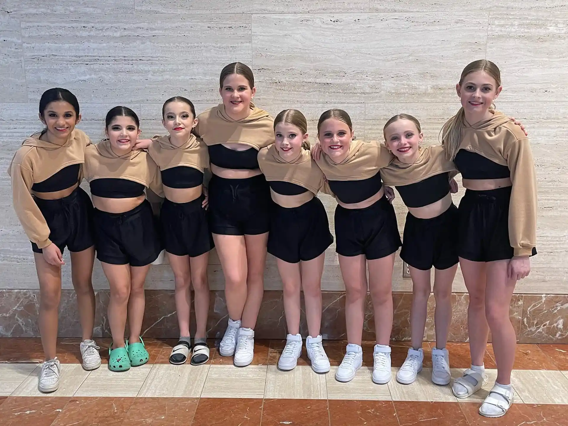 a group of girls in matching uniforms