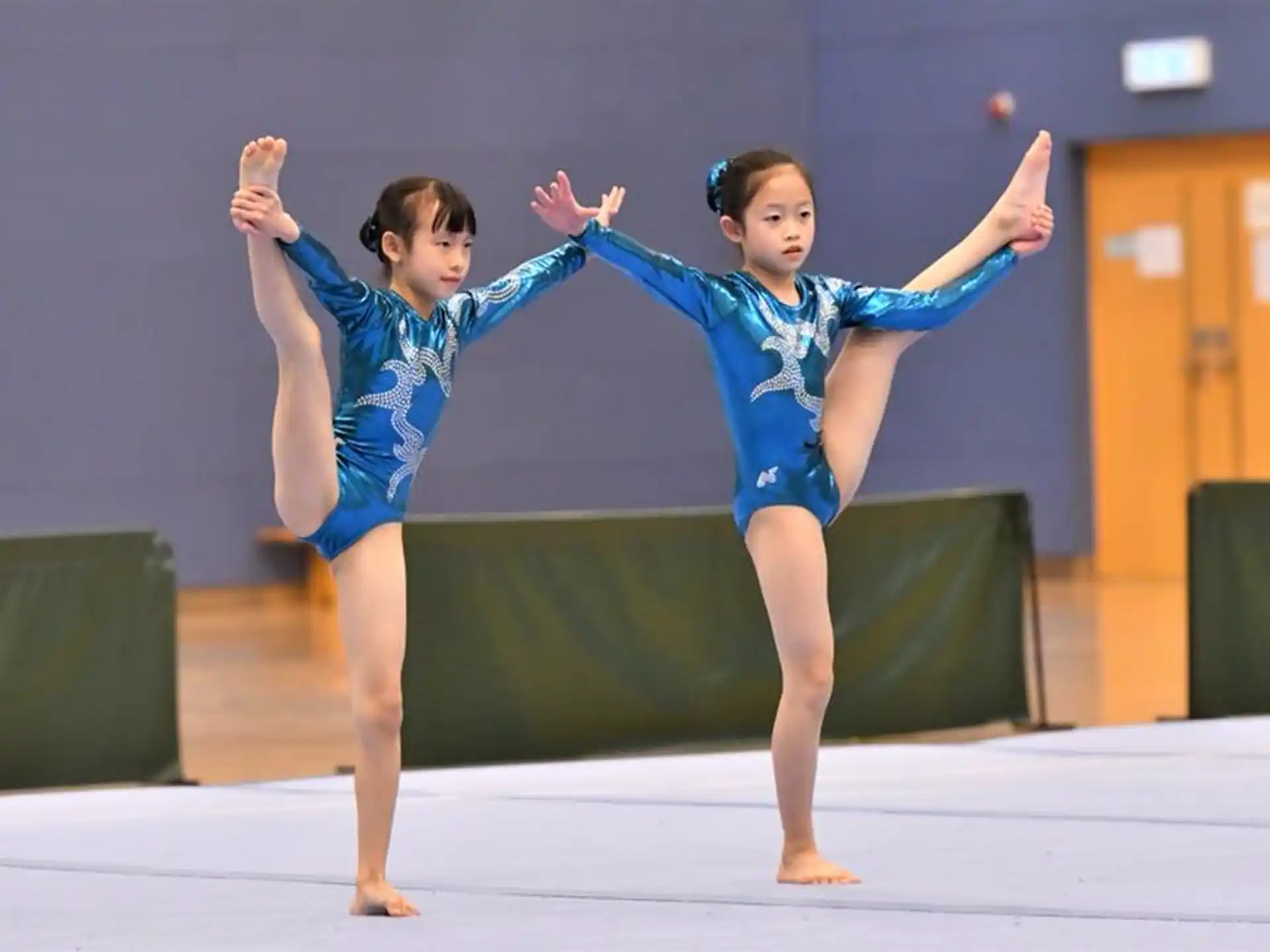 a couple of girls dancing