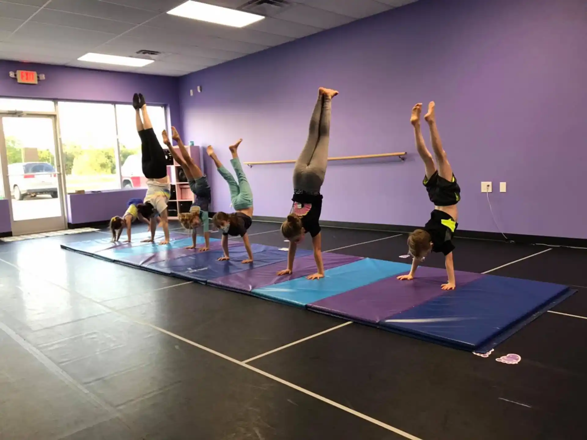 a group of people doing yoga