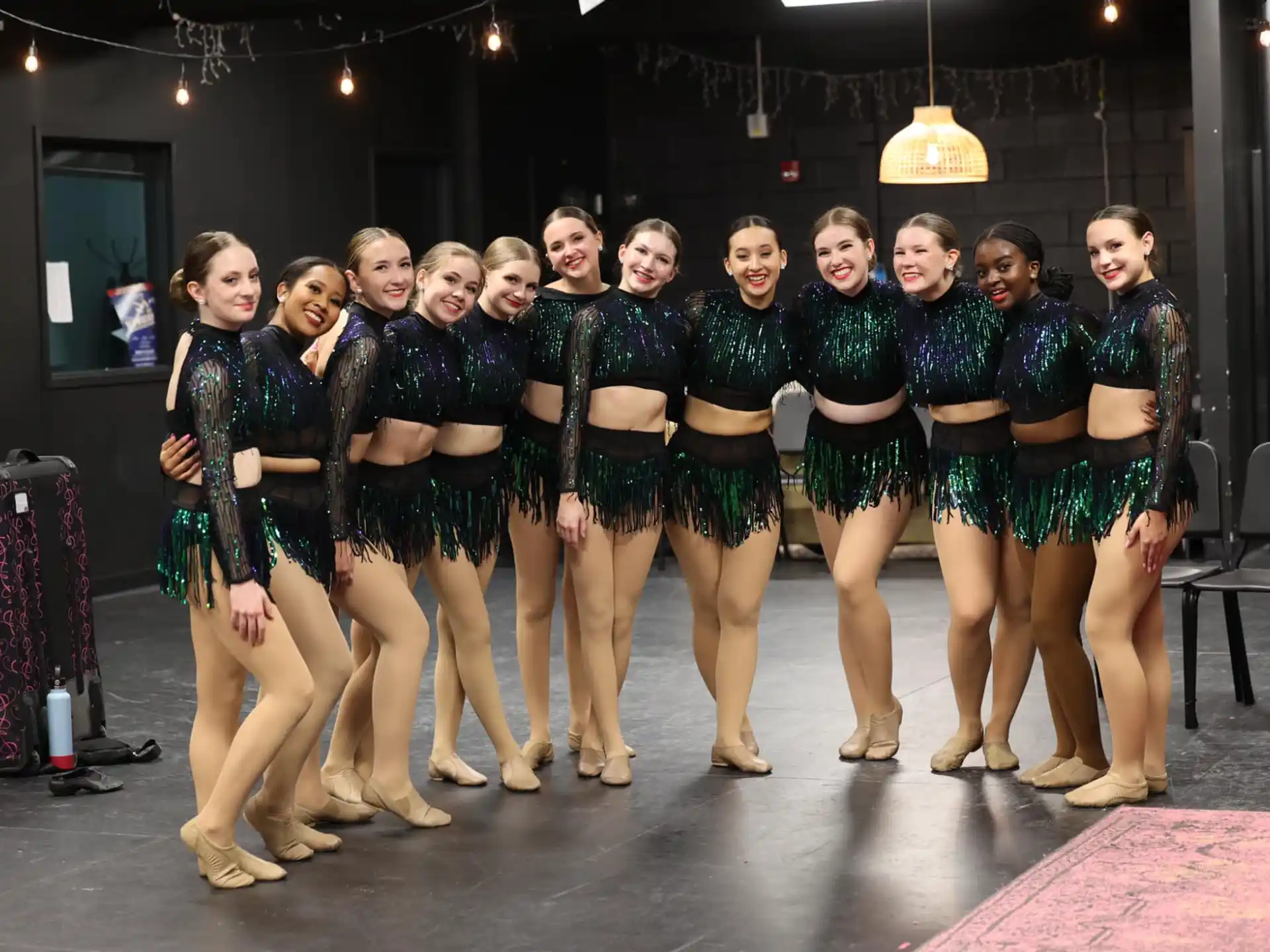 a group of women in matching outfits