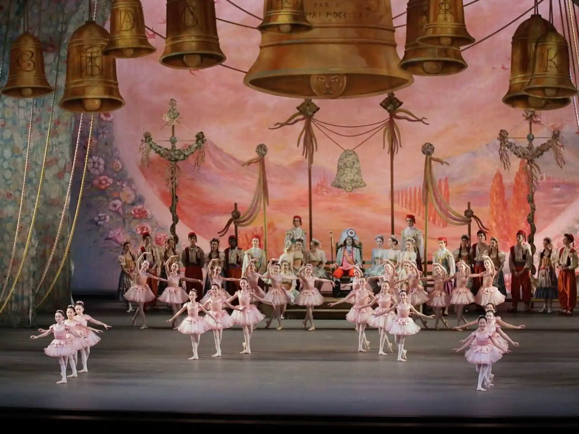 a group of people performing on stage
