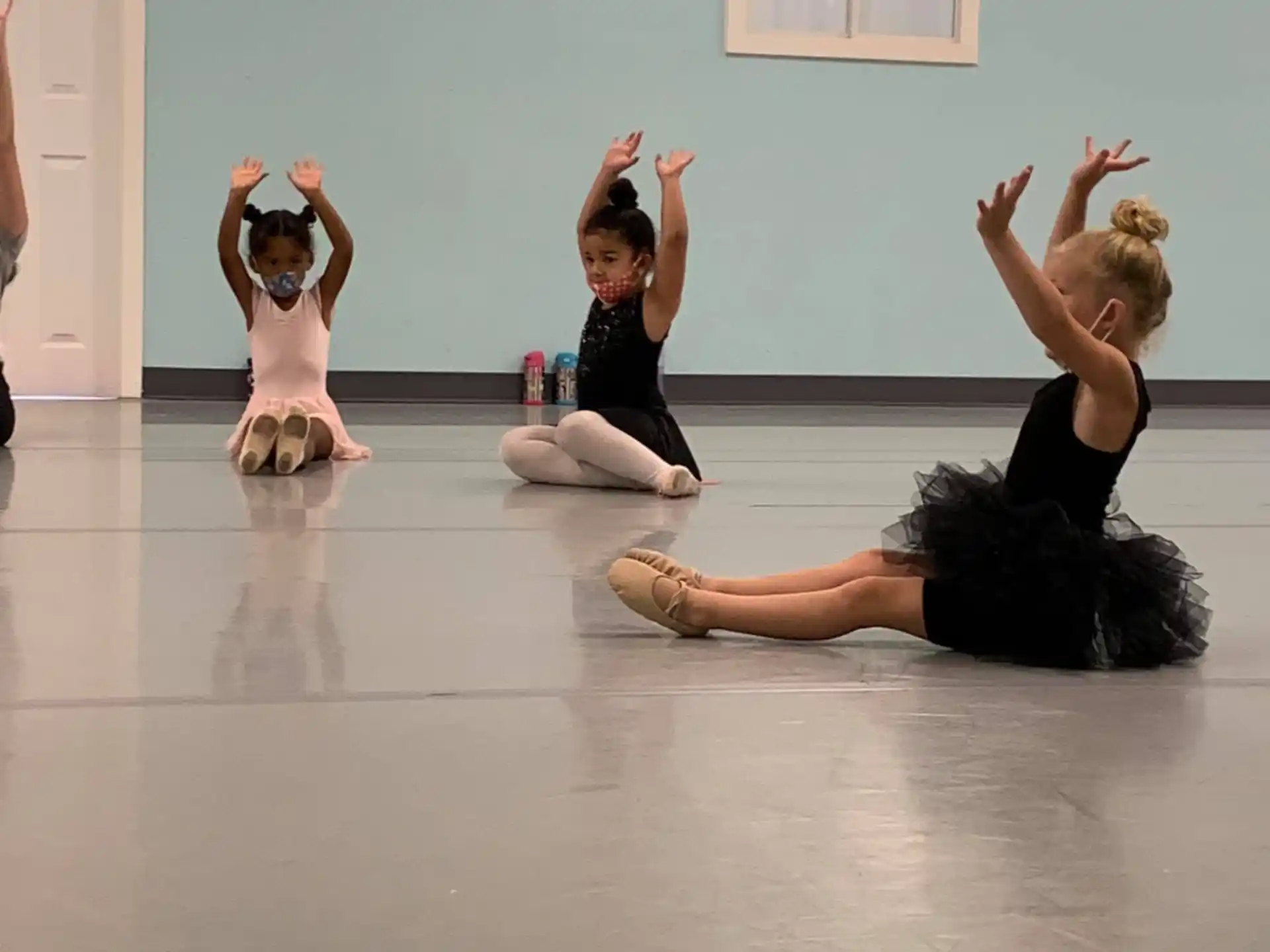 a group of women doing yoga