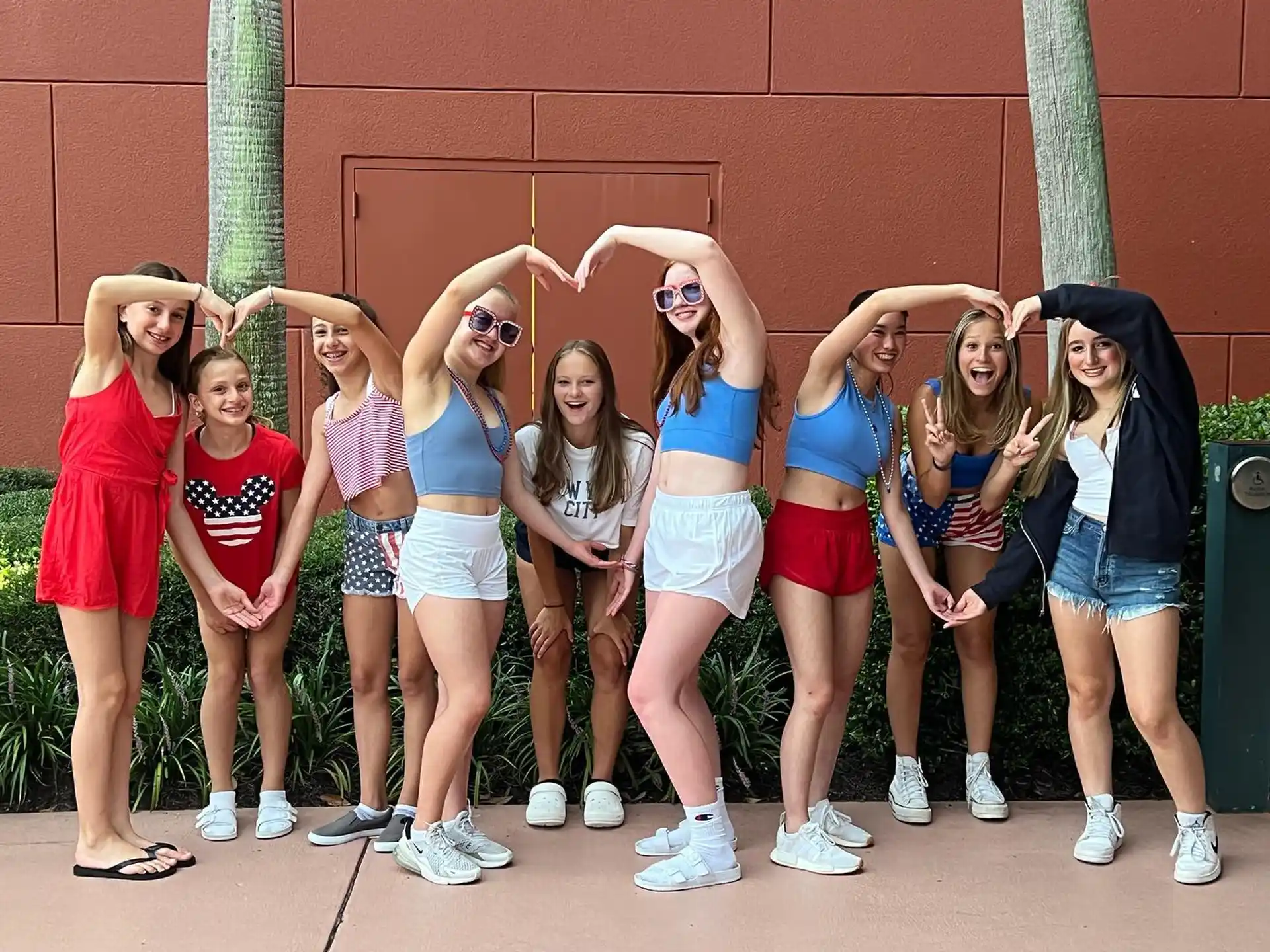 a group of women posing for a photo