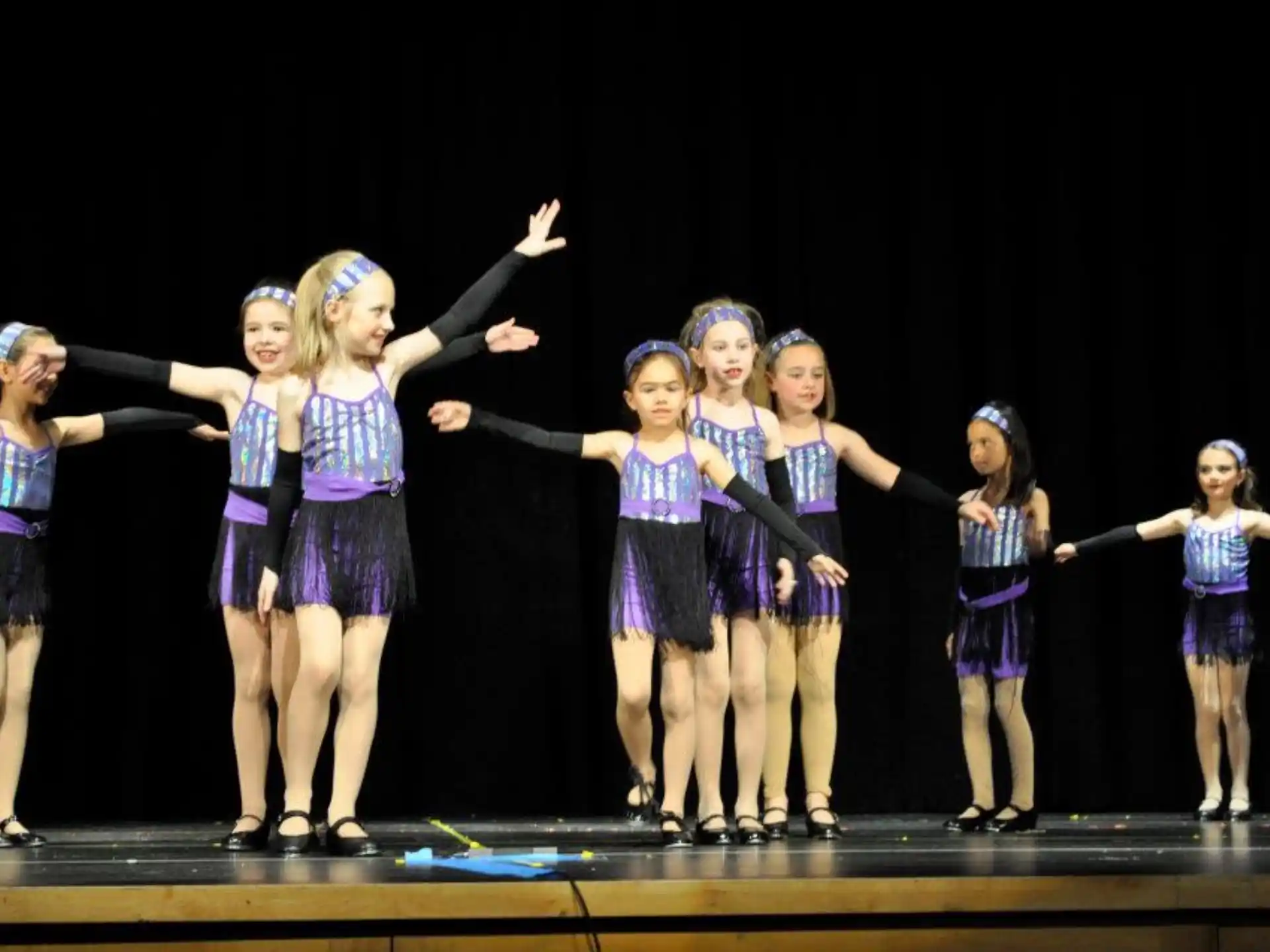 a group of girls on a stage
