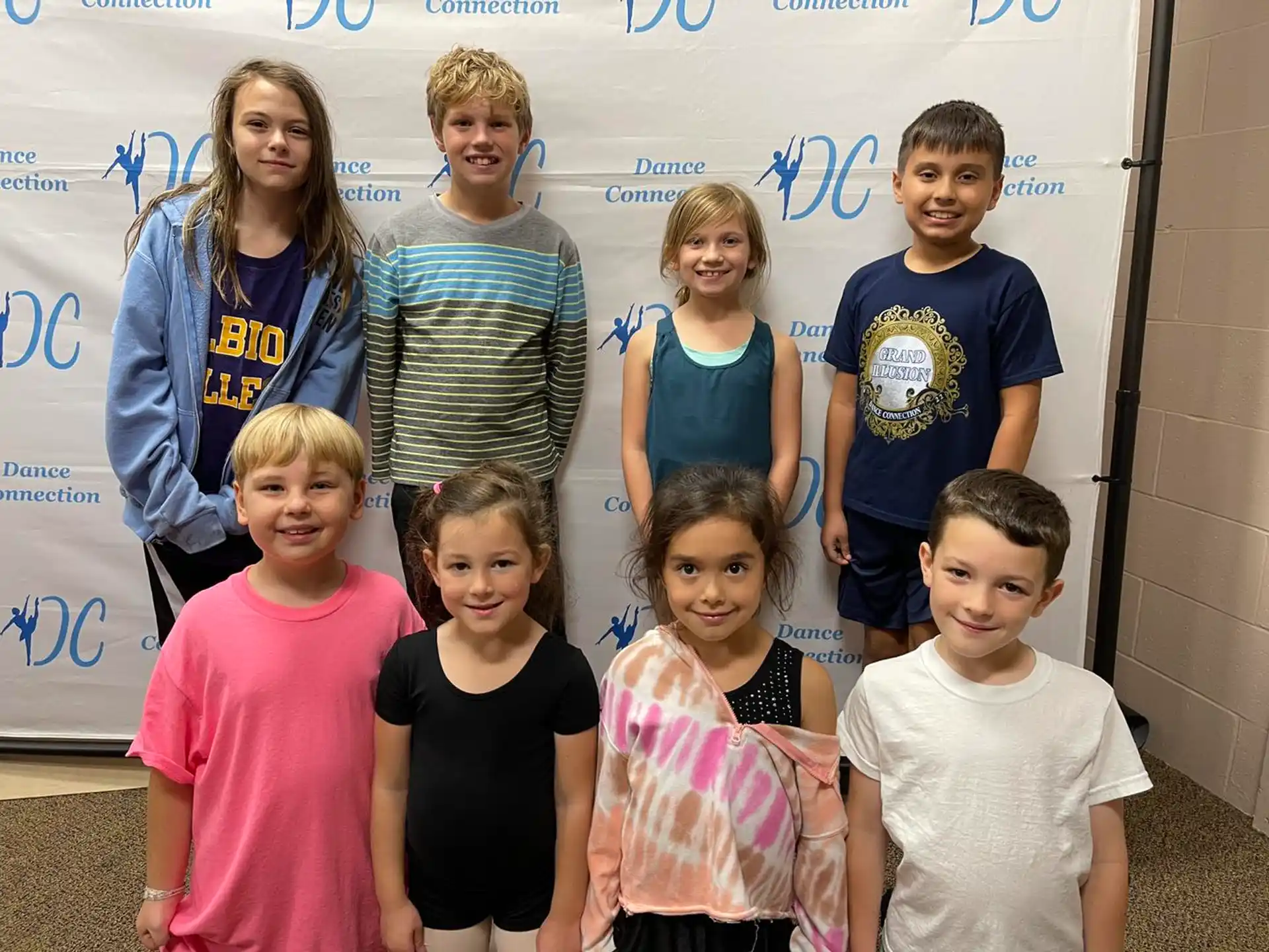 a group of children posing for a photo