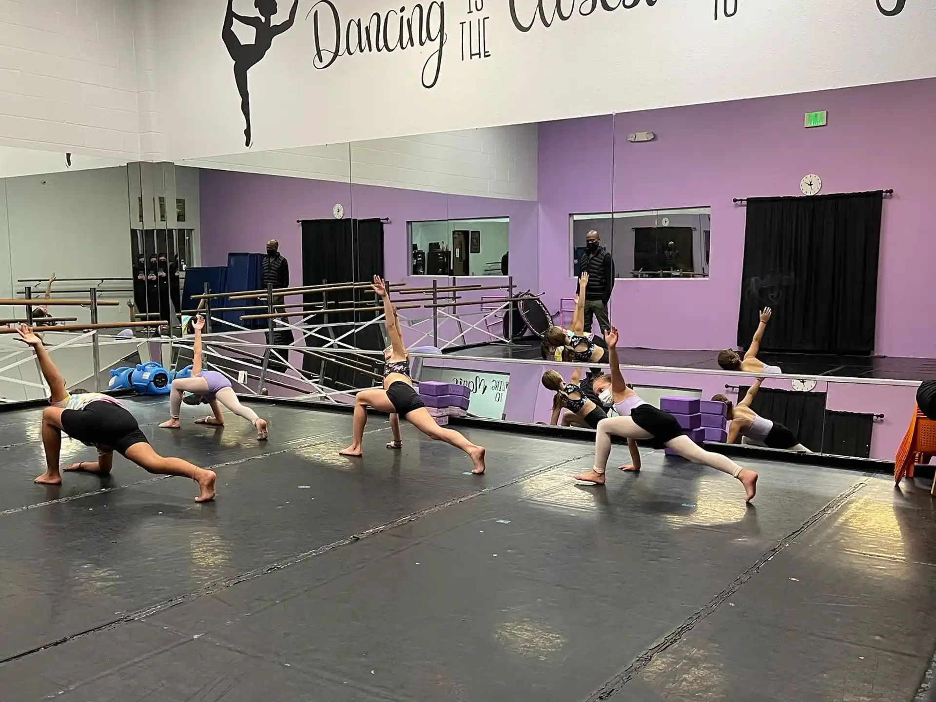 a group of people doing yoga