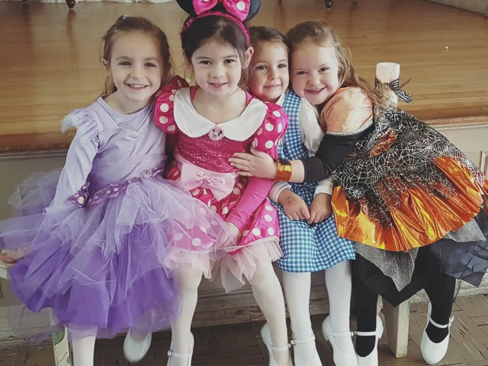 a group of girls in clothing
