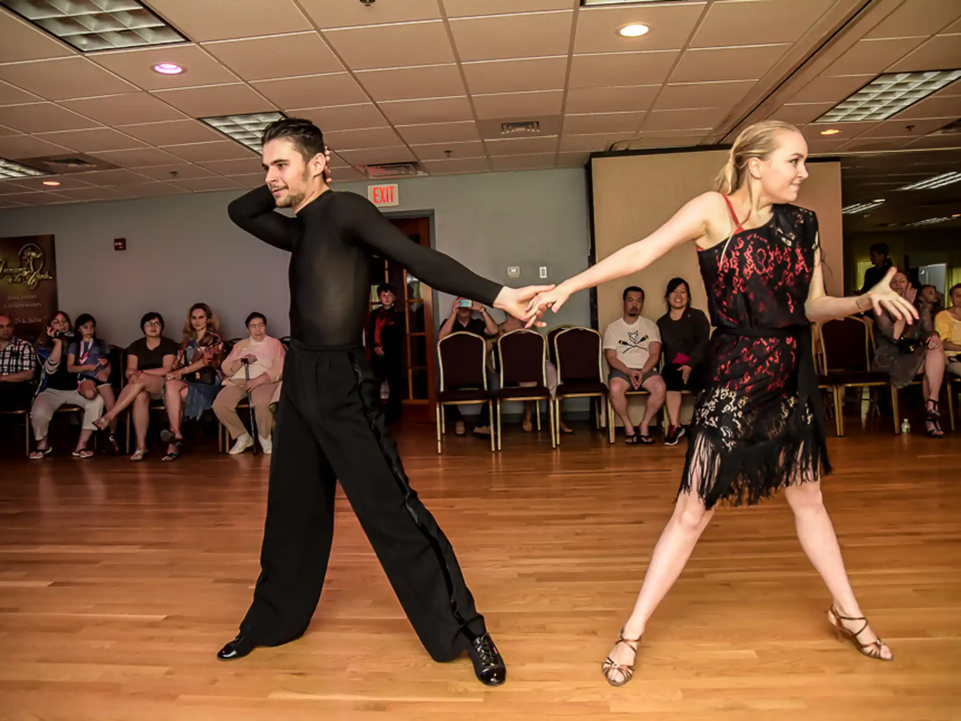 a man and woman dancing
