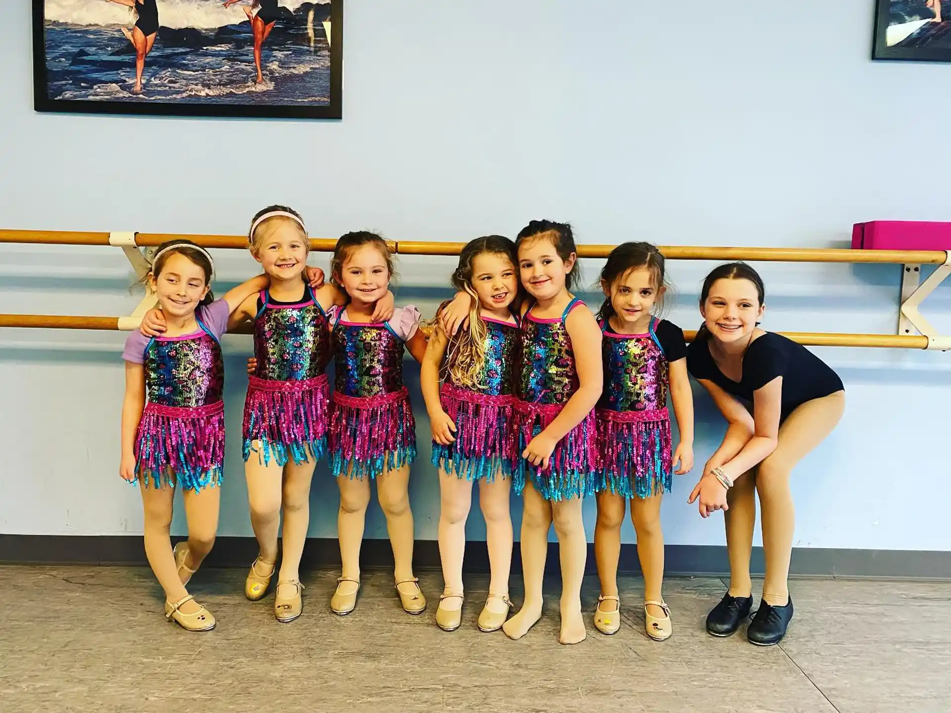 a group of girls posing for a photo