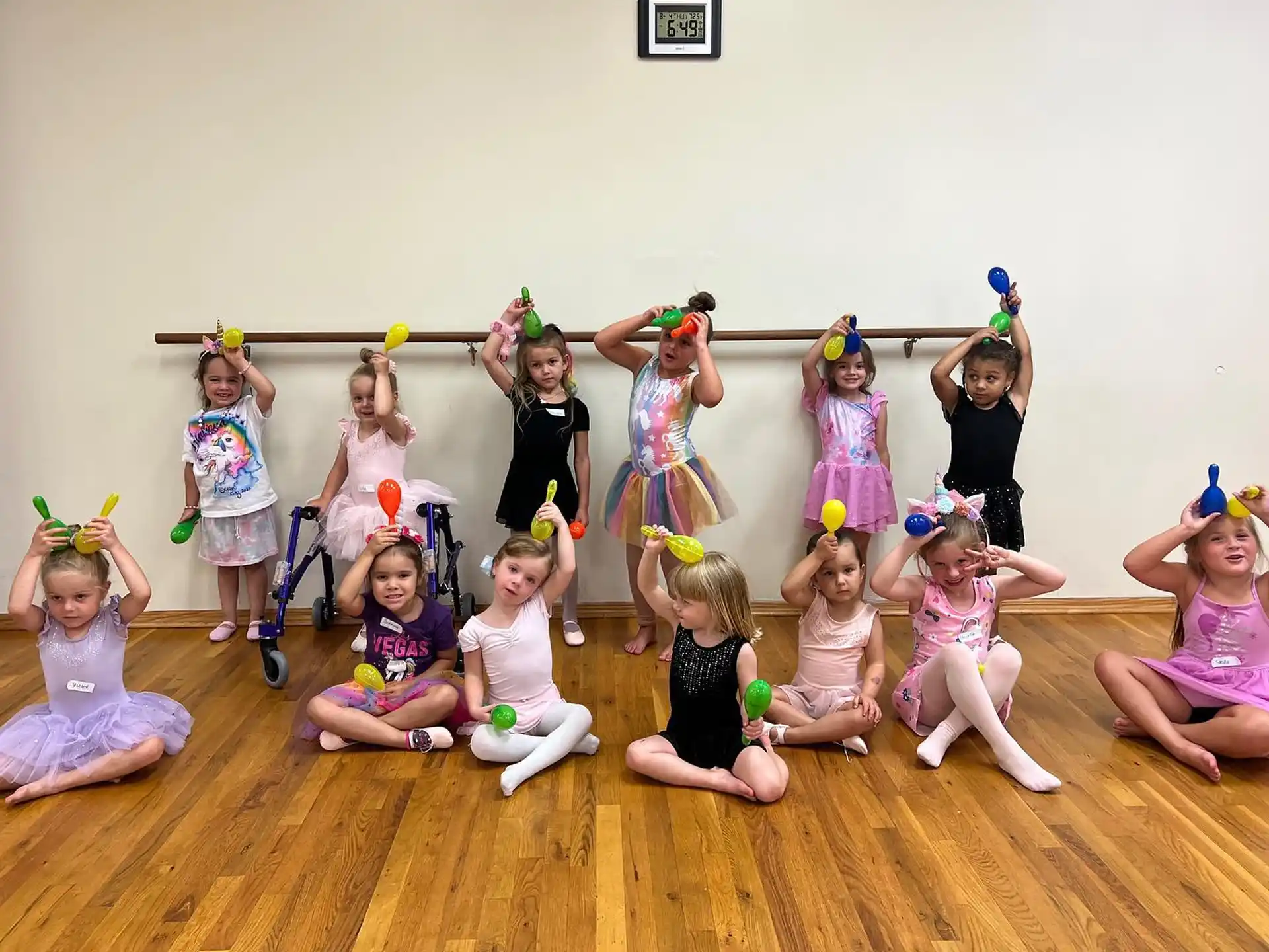 a group of girls wearing party hats