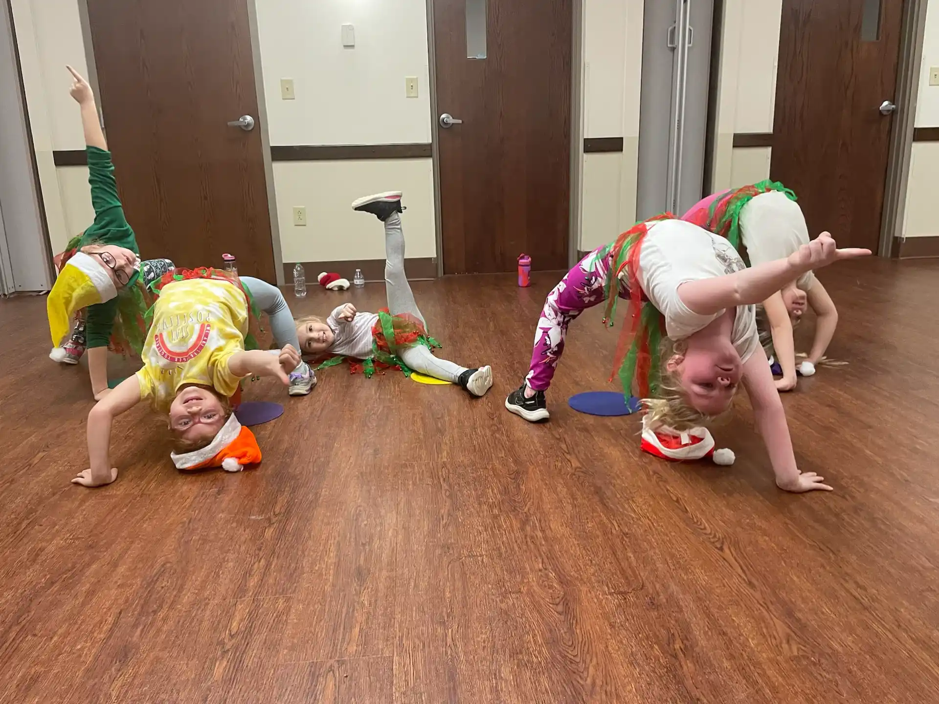 a group of children doing yoga