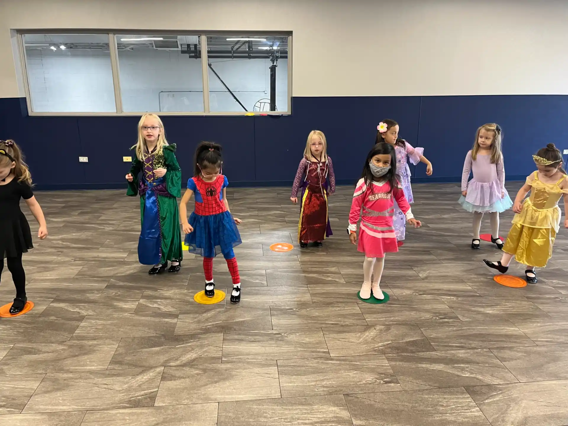 a group of children in clothing