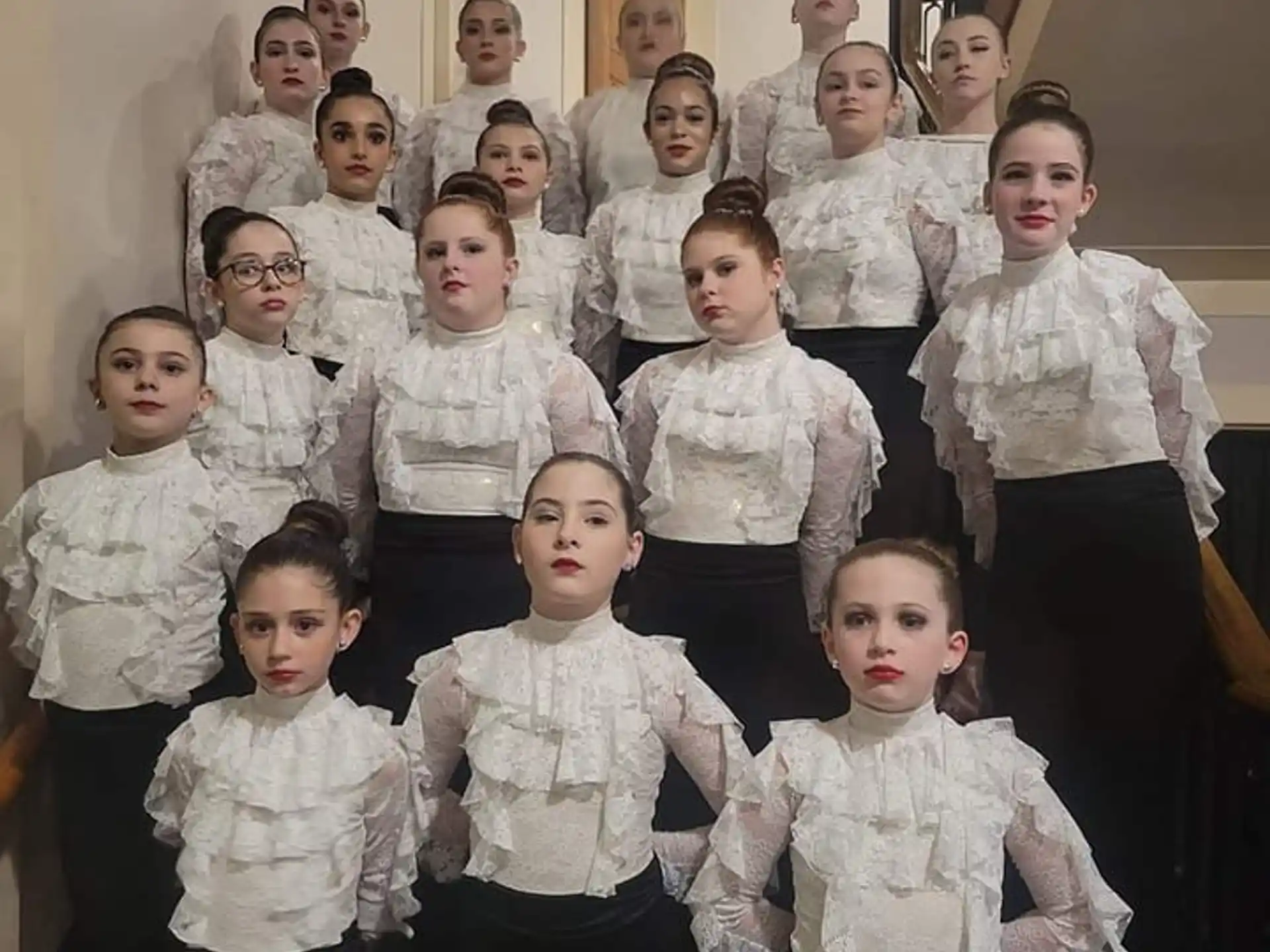 a group of children posing for a photo