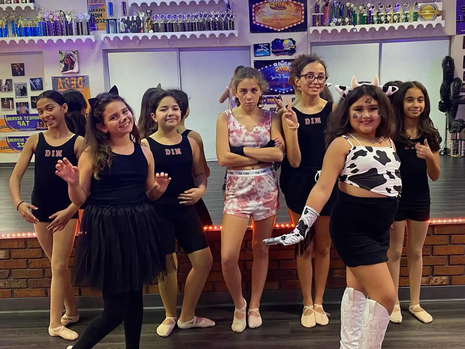 a group of women posing for a photo