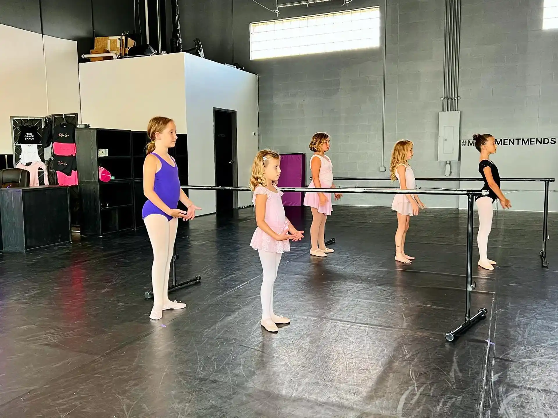 a group of women on a stage