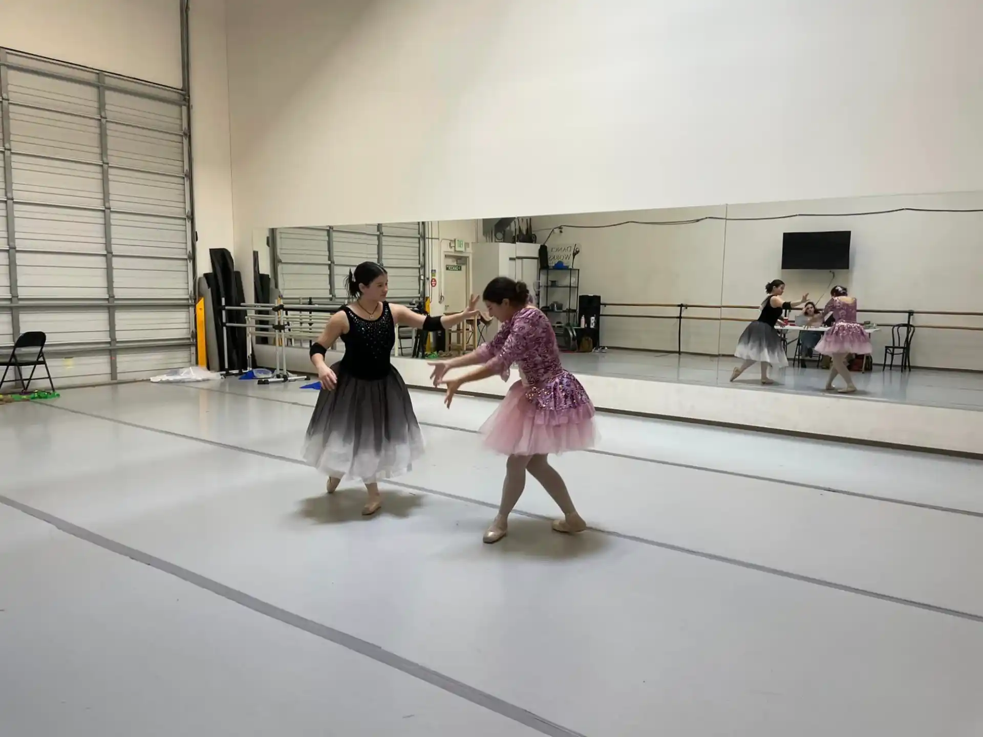 a couple of girls dancing