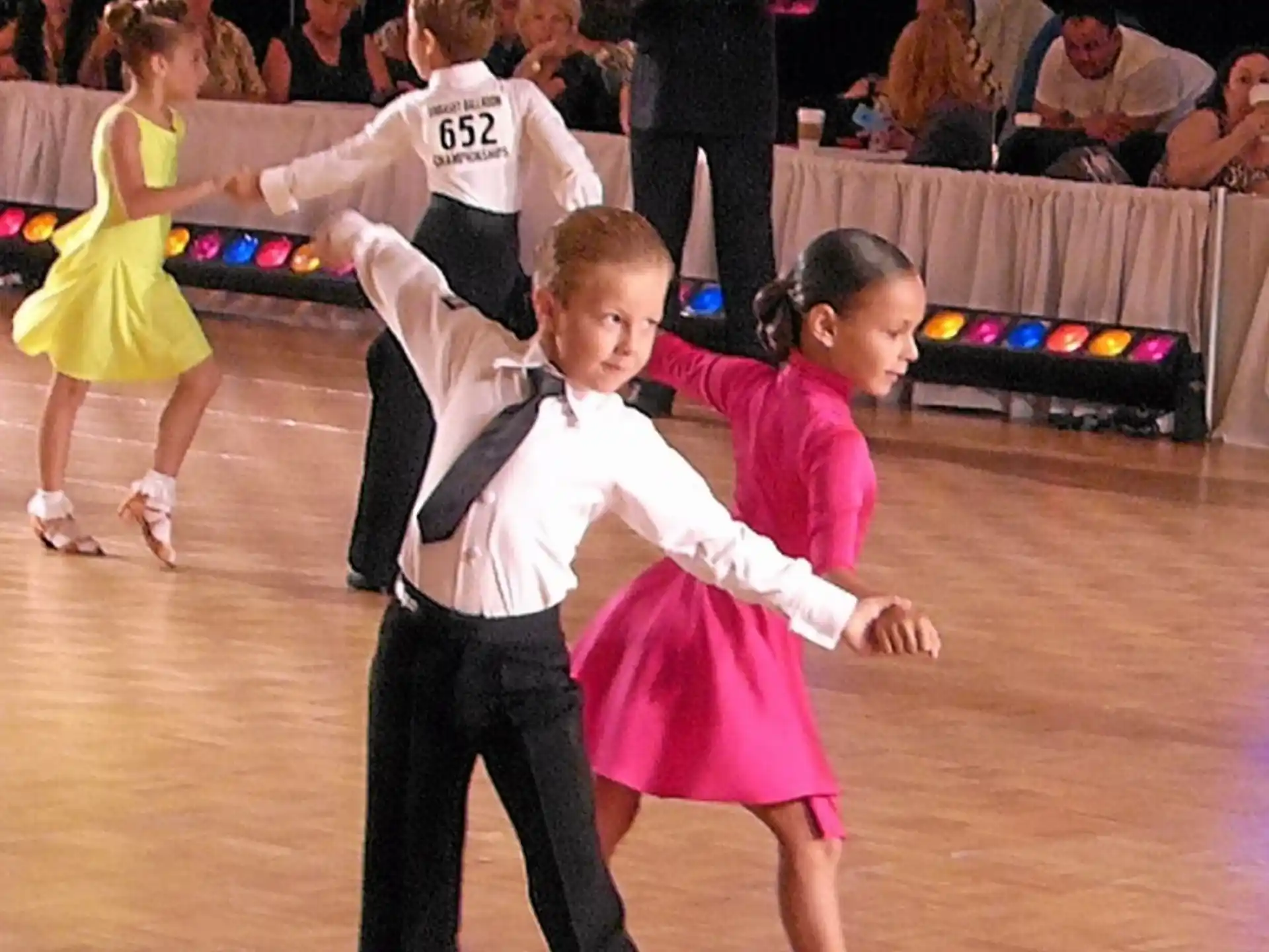 a boy and girl dancing