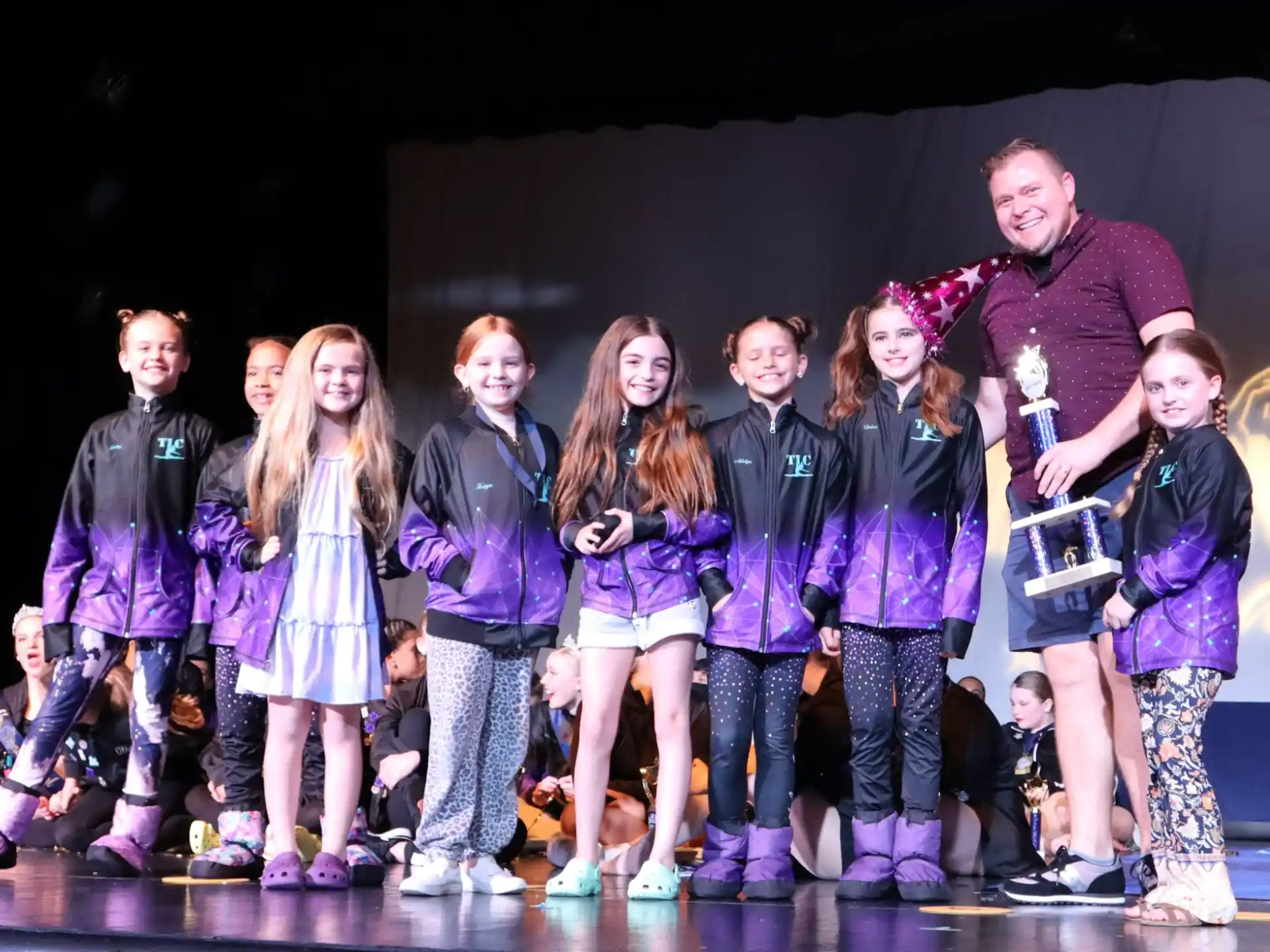 a group of people on a stage